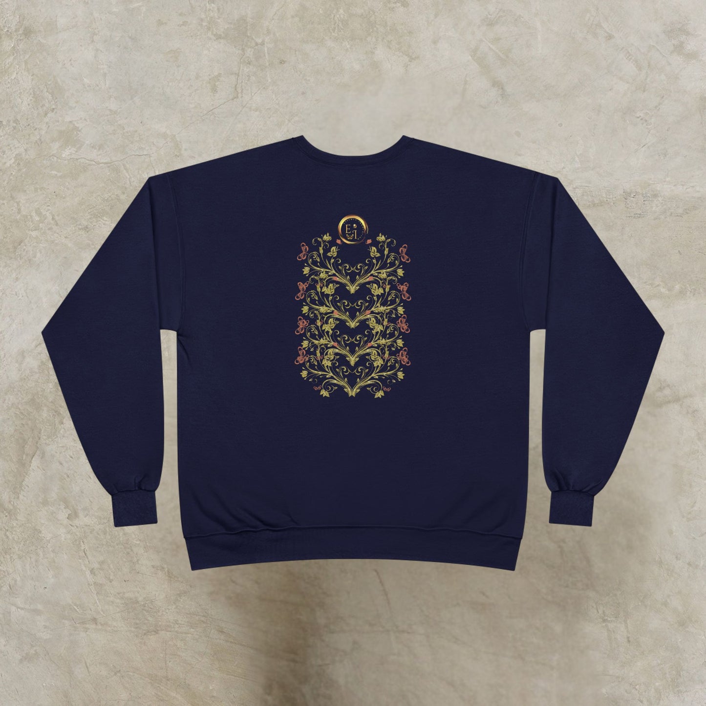 Navy blue sweatshirt with a floral Essence Innovation Bohemian Butterfly Crest design on a beige surface