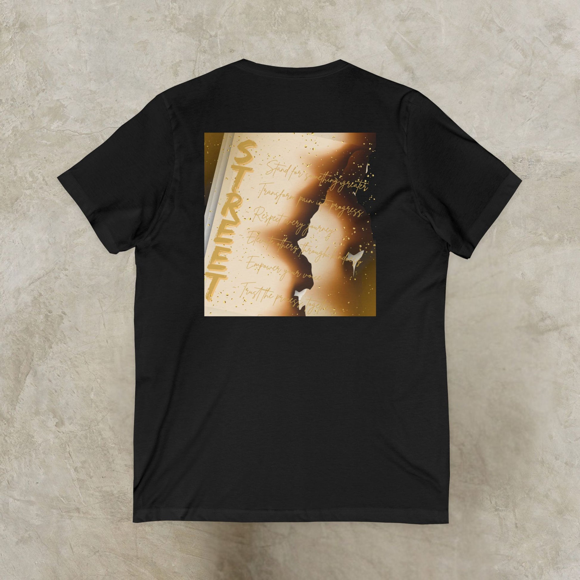Black EssenceInnoCreate t-shirt with a graphic design on the back on a beige background