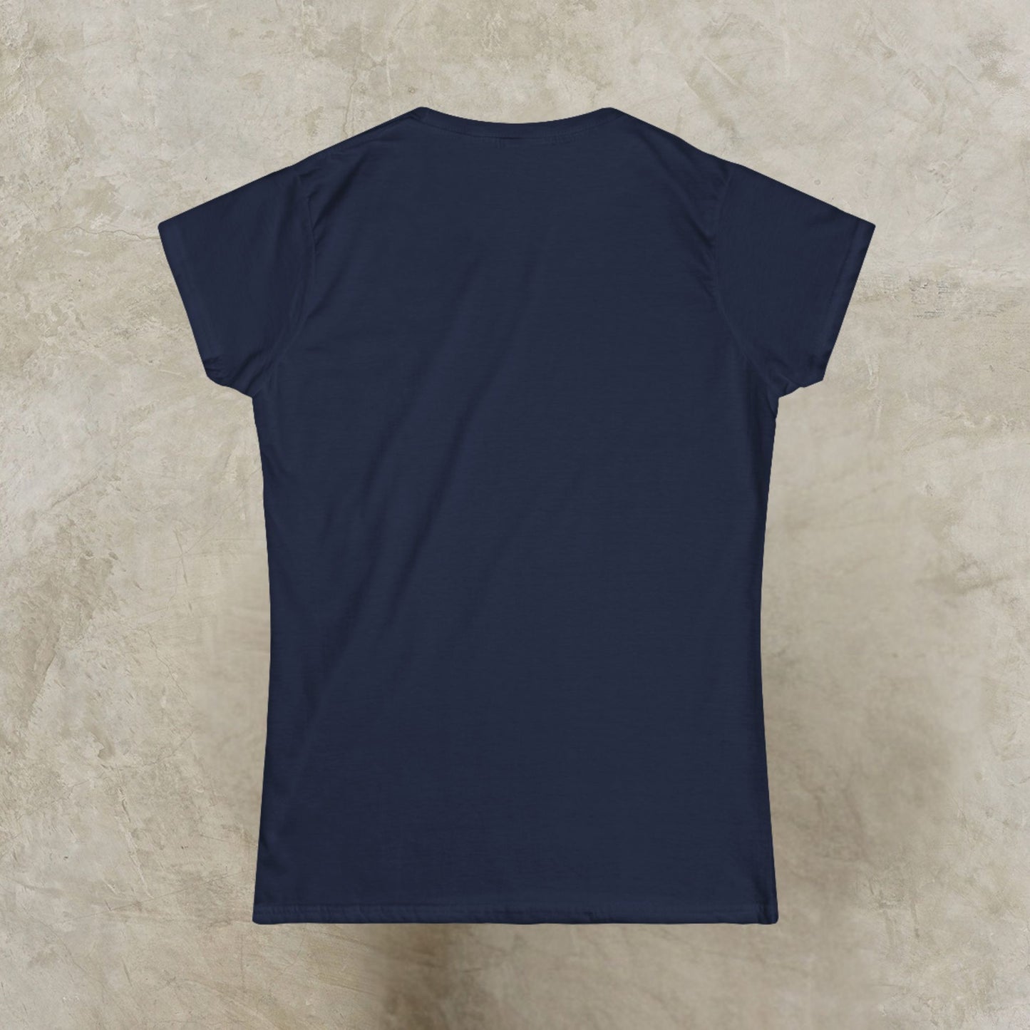 Navy blue t-shirt on a beige textured background