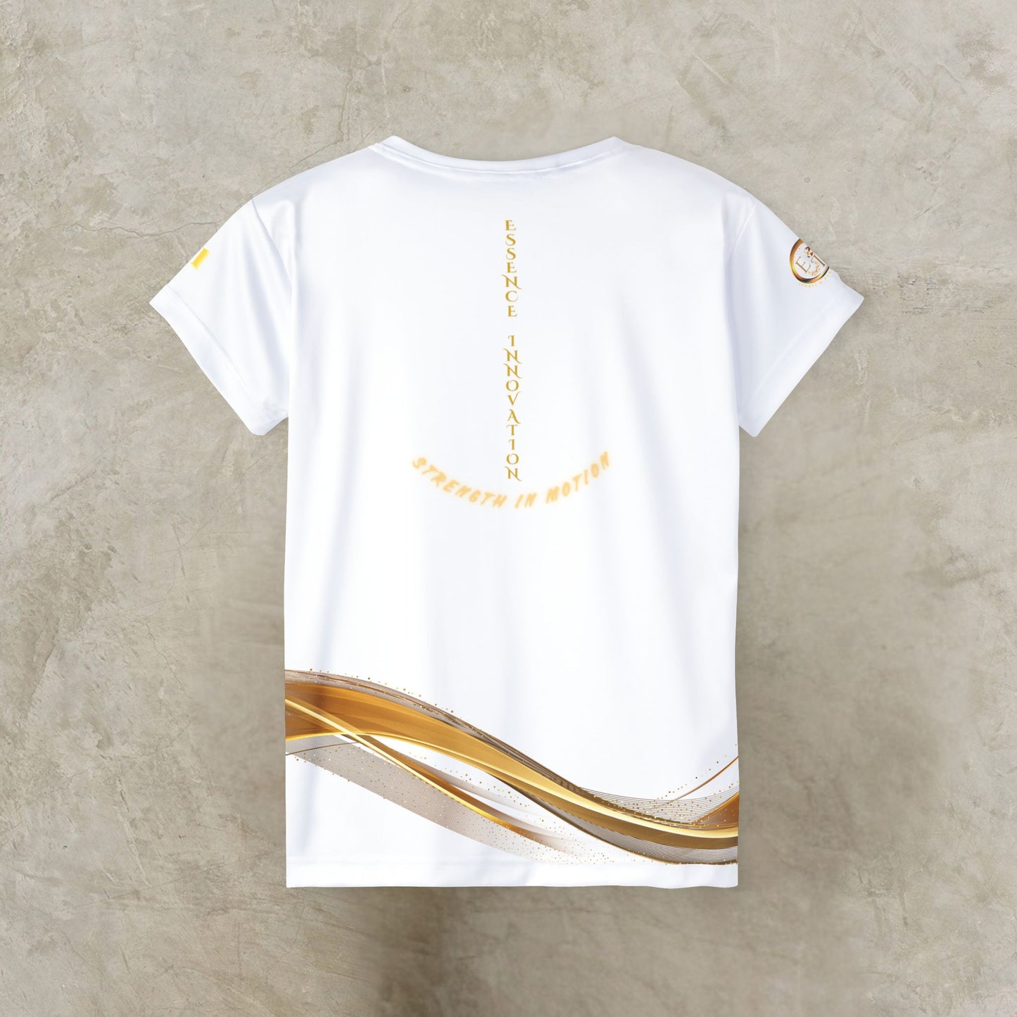 White t-shirt with gold and black design on a textured beige background