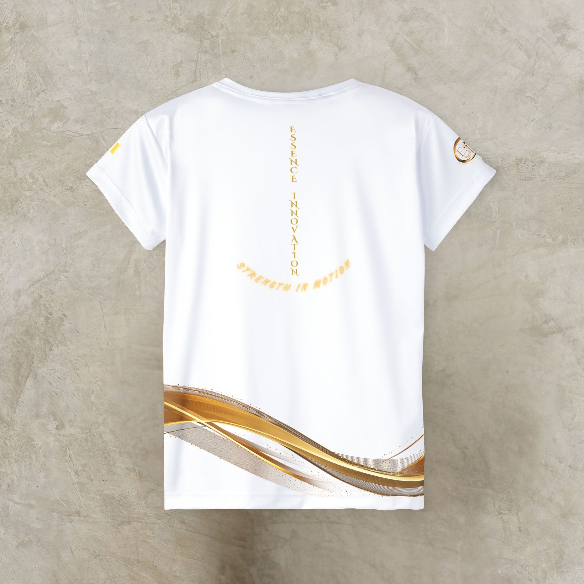 White t-shirt with gold and black design on a textured beige background