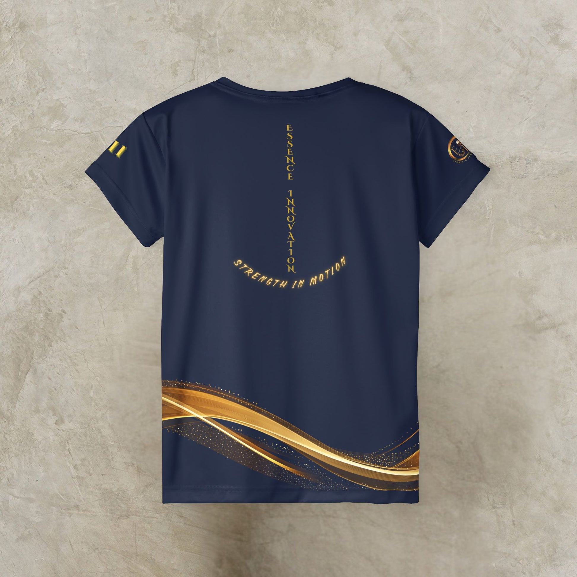 Navy blue t-shirt with gold designs and text on a textured beige background