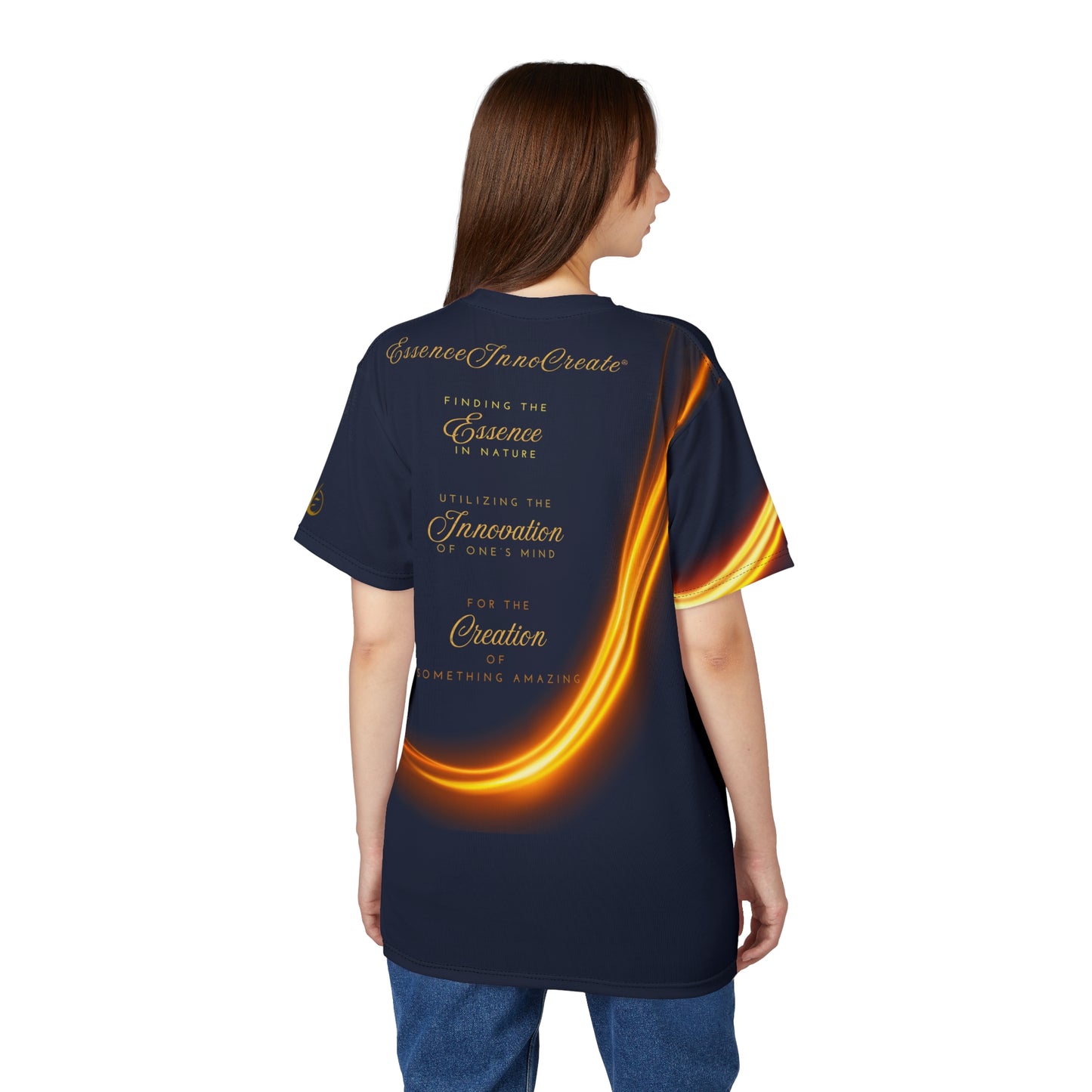 Person wearing a navy blue t-shirt with text and a glowing design on the back, on a white background.