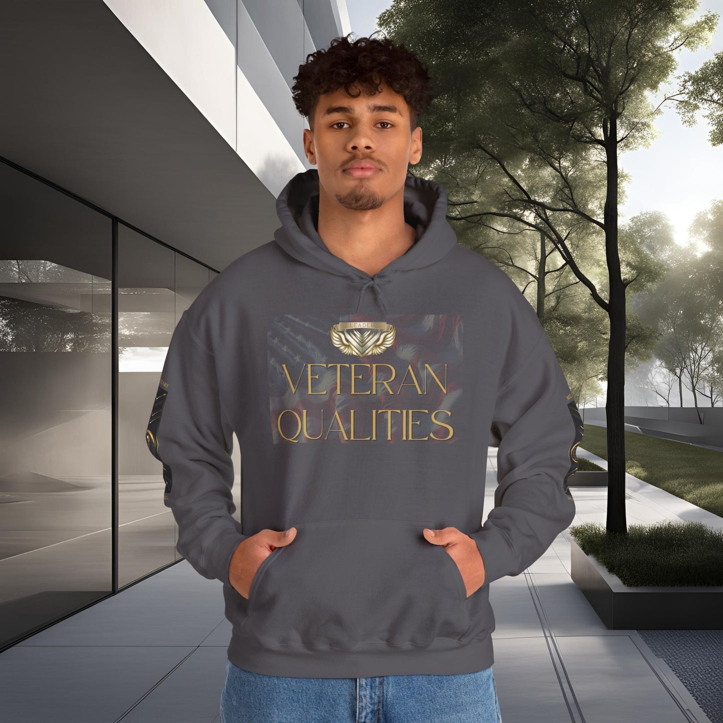 Person wearing an Essence Innovation hoodie with 'Veteran Qualities' text in an outdoor setting