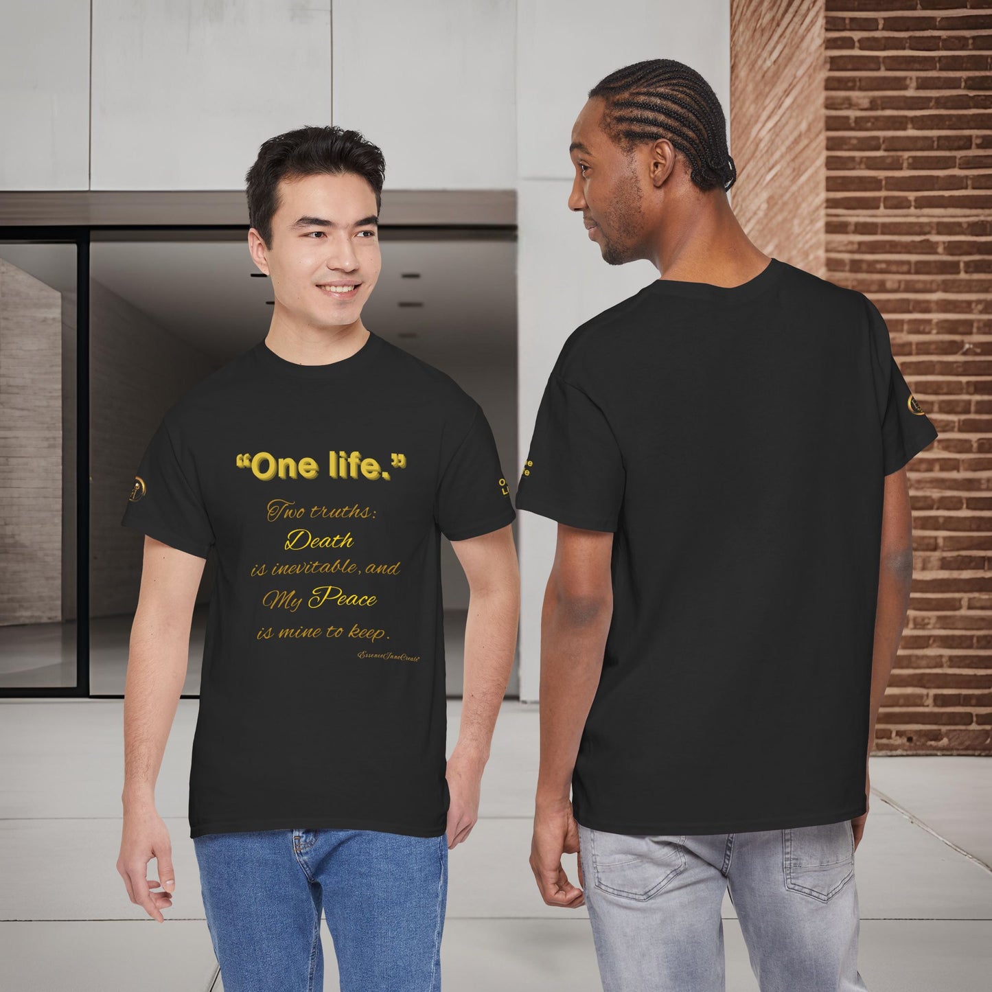 Two people wearing black t-shirts with One Life text, one indoors and one outdoors.