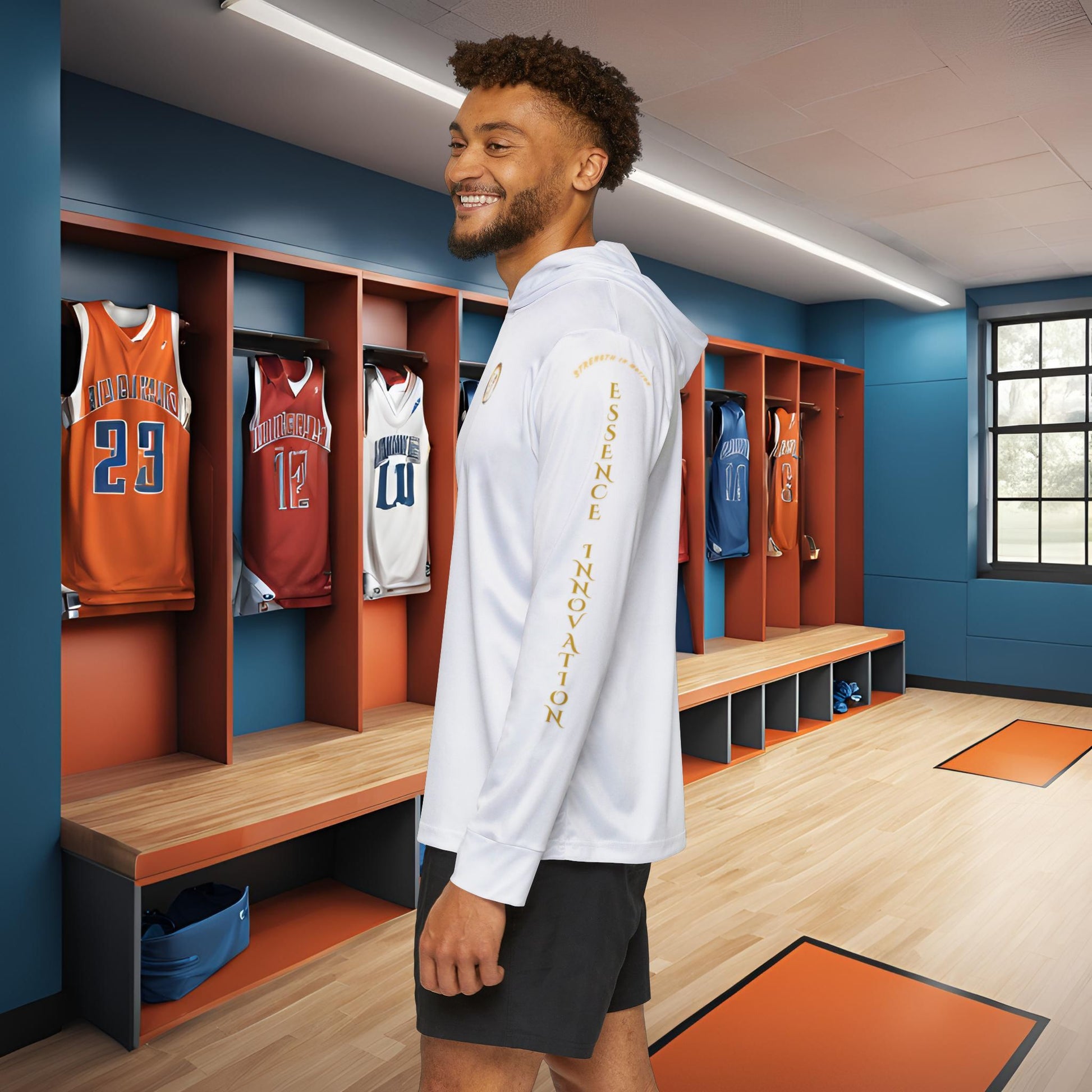 Man standing in a locker room with Essence Innovation Seek More hoodie