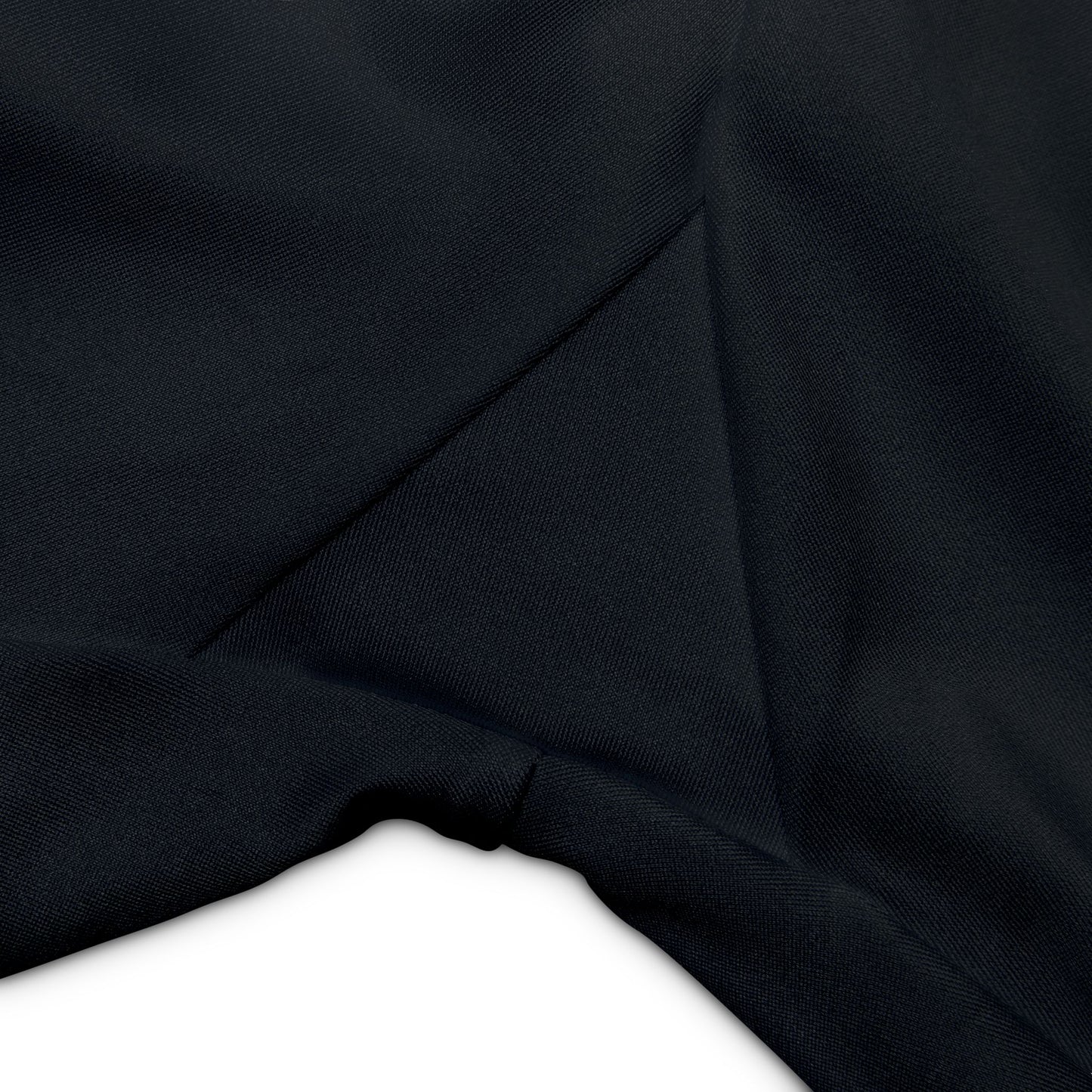 Close-up of black fabric with a slight texture on a white background