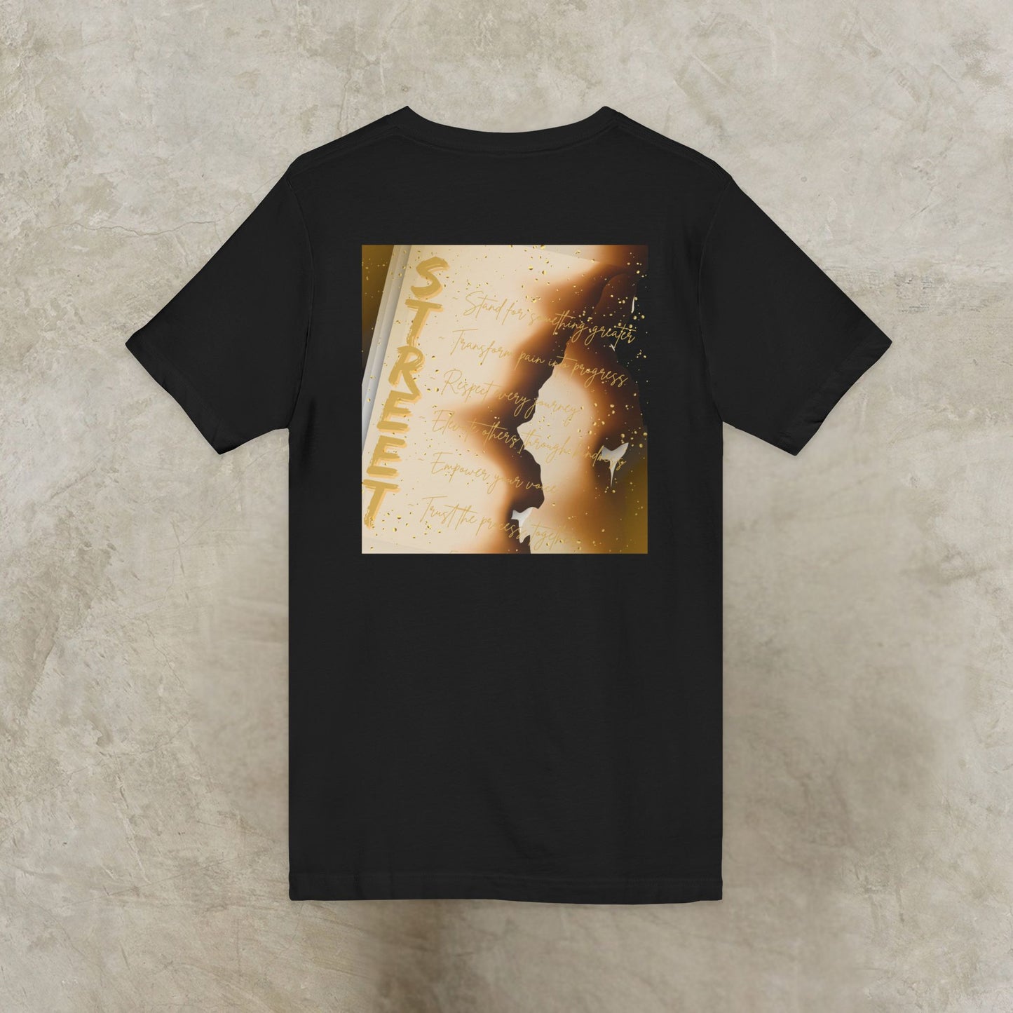 Black EssenceInnoCreate t-shirt with a graphic design on a textured beige background