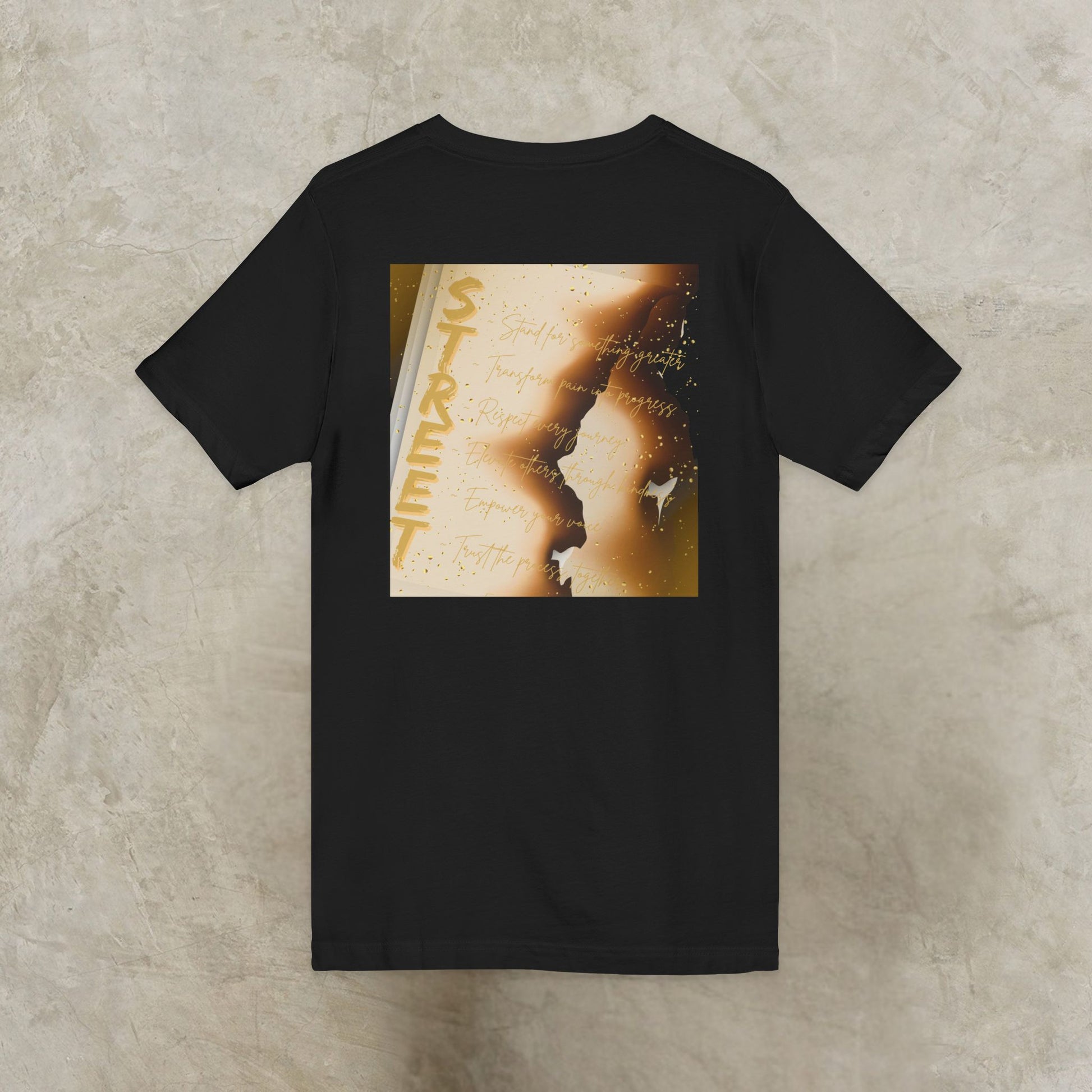 Black EssenceInnoCreate t-shirt with a graphic design on a textured beige background
