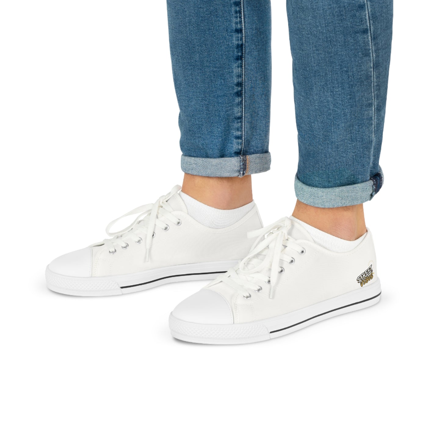 White Essence Innovation 'Street Vibes' sneakers worn with rolled-up blue jeans on a white background
