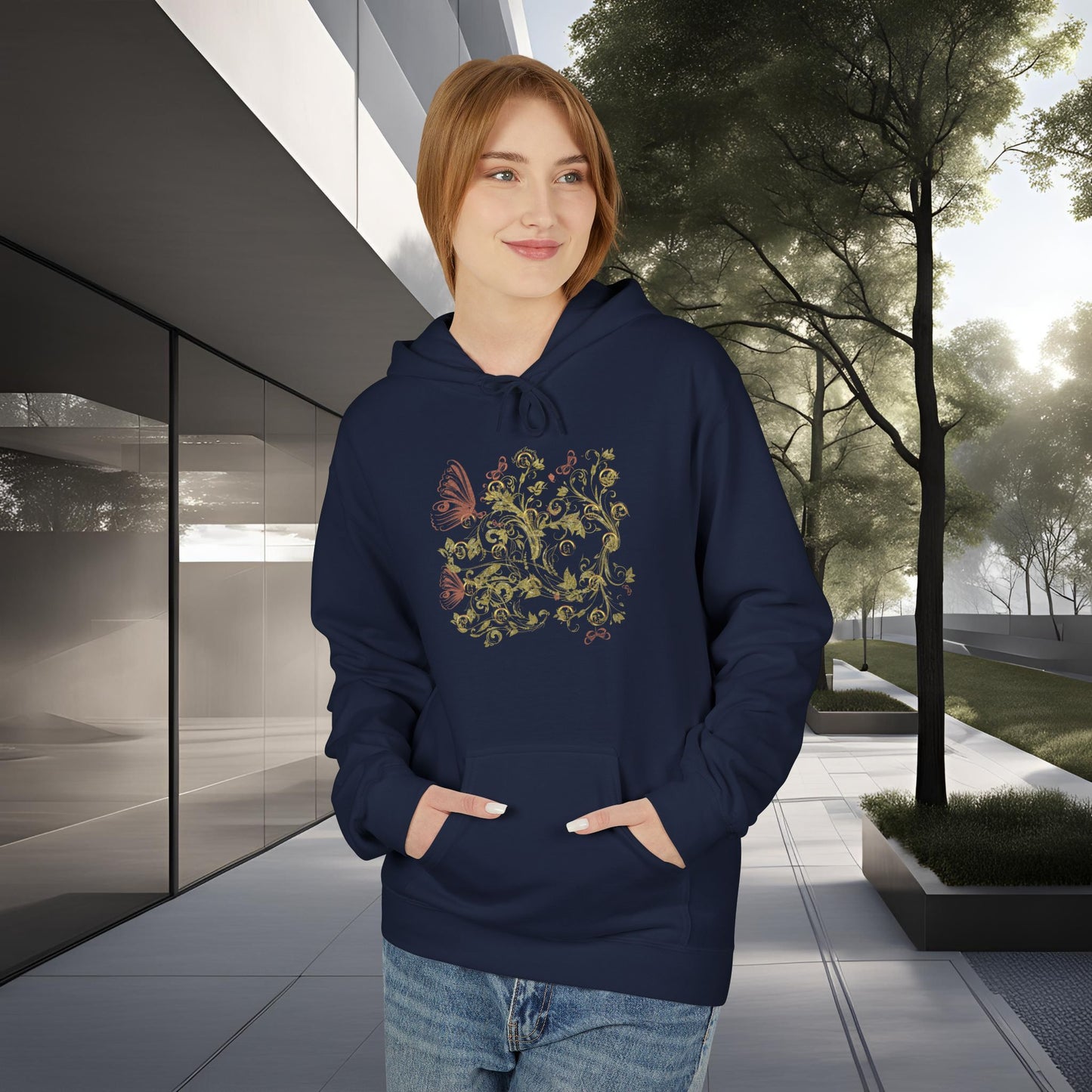 Person wearing a navy blue hoodie with floral Essence Innovation Bohemian Butterfly design in an outdoor setting