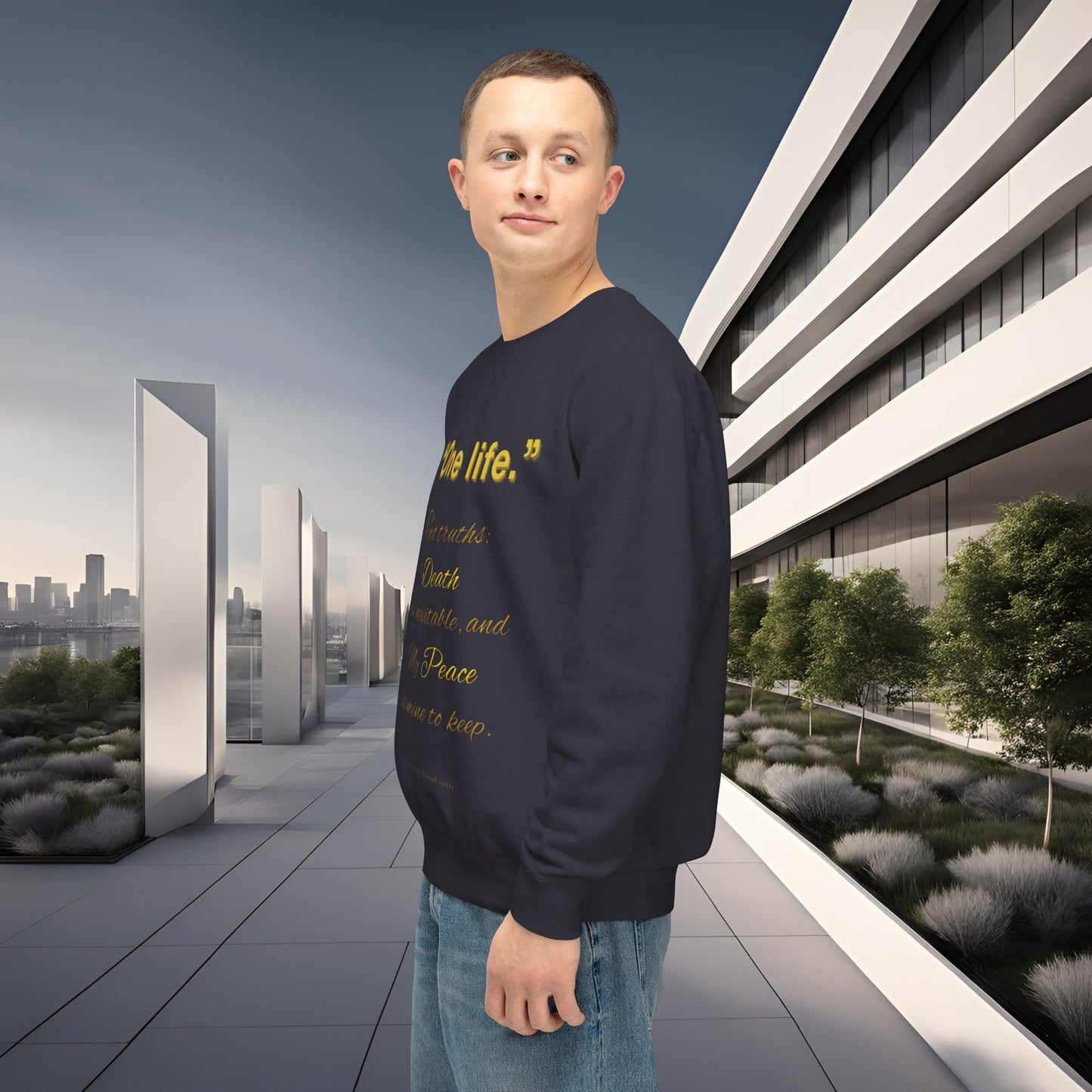 Man wearing a black sweatshirt with yellow text in an urban setting