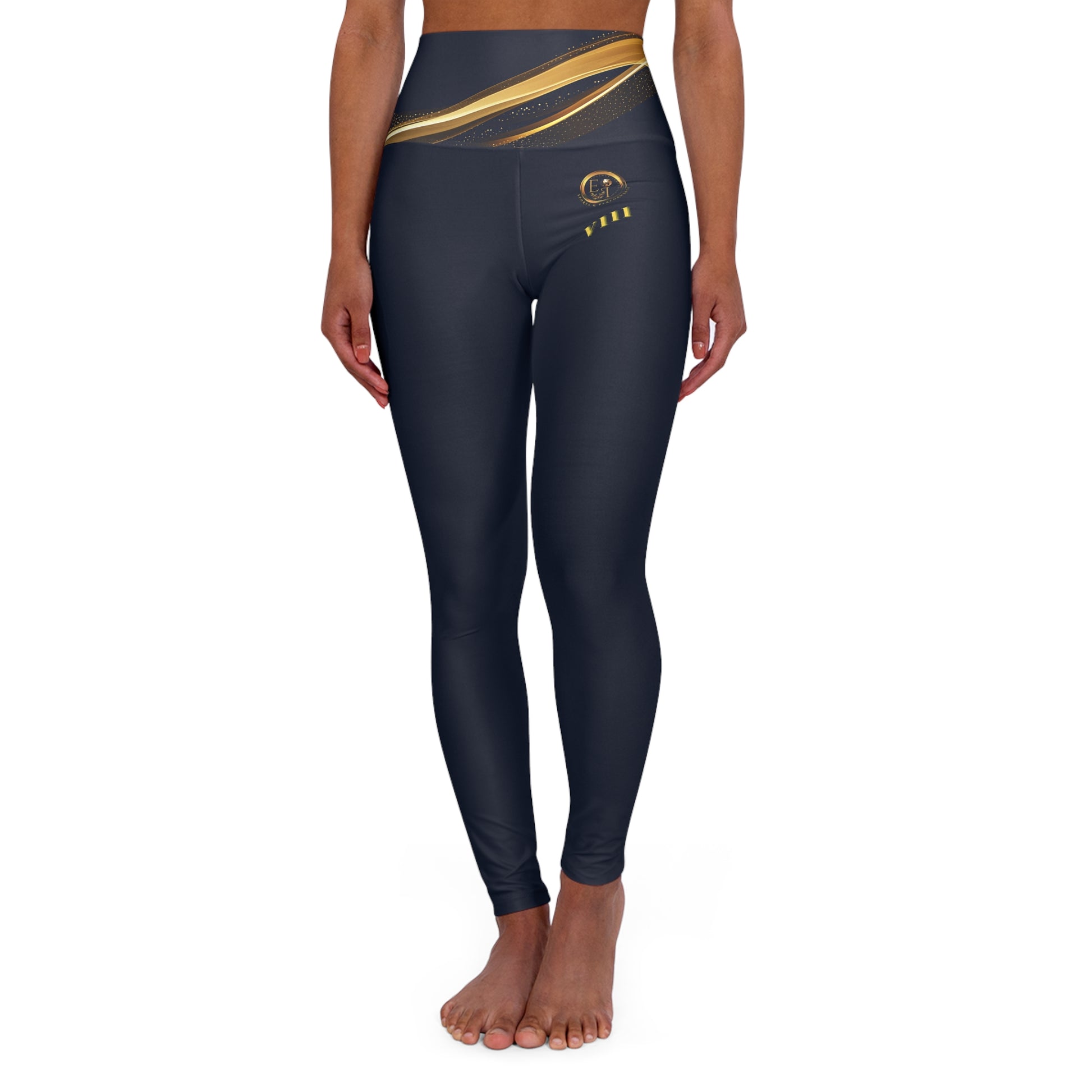 Black leggings with gold accents on a white background