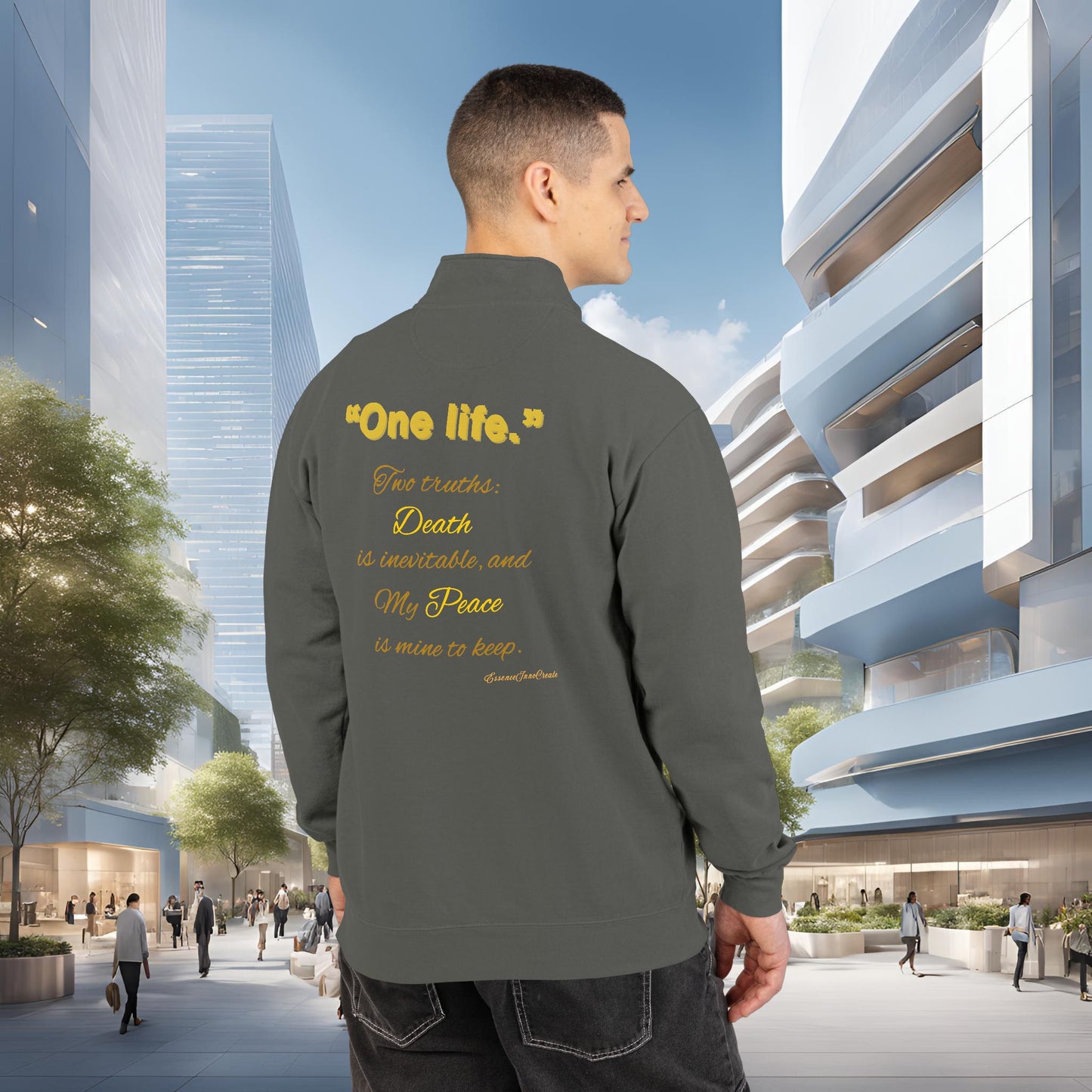 Man wearing a jacket with One Life text in an urban setting