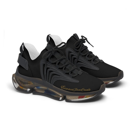 Black 'EssenceInnoCreate' sneakers with unique sole design on a white background
