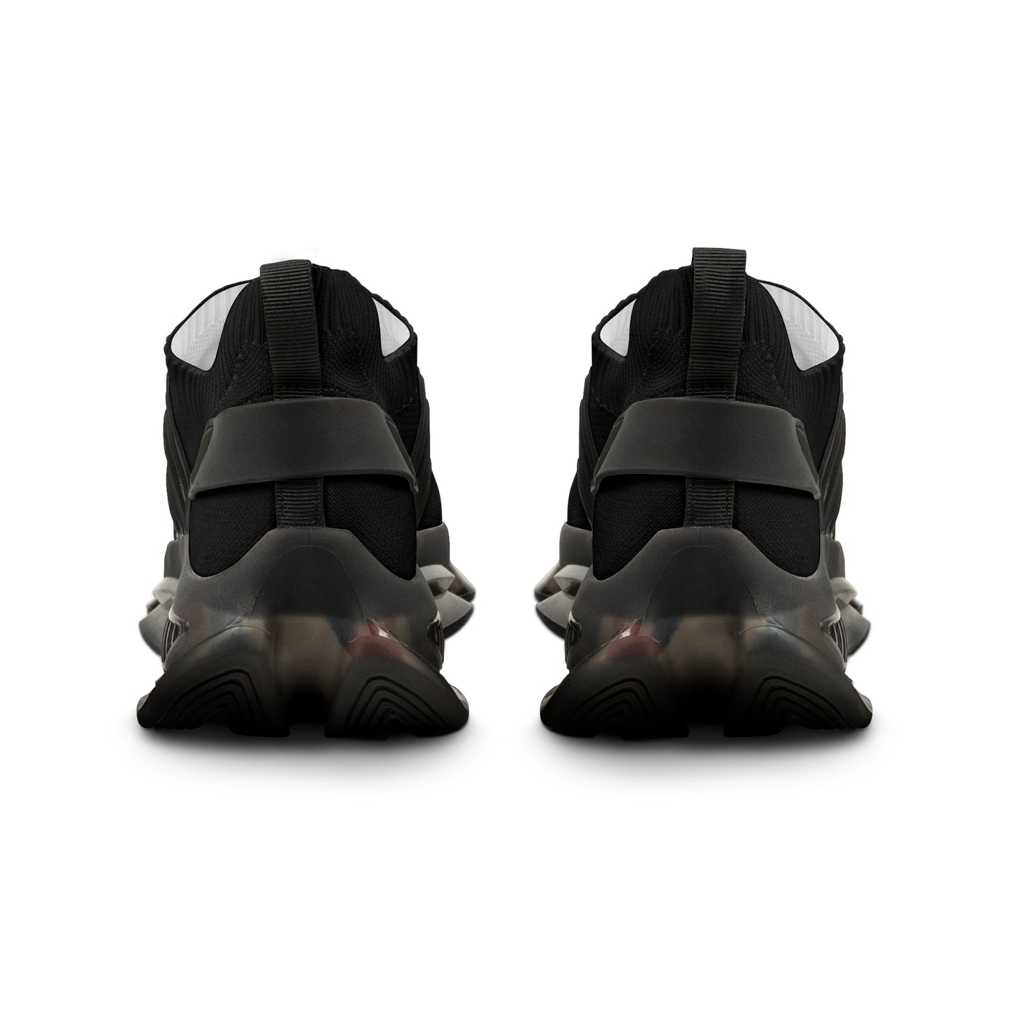 Black low-top 'EssenceInnoCreate' sneakers with a white sole on a white background