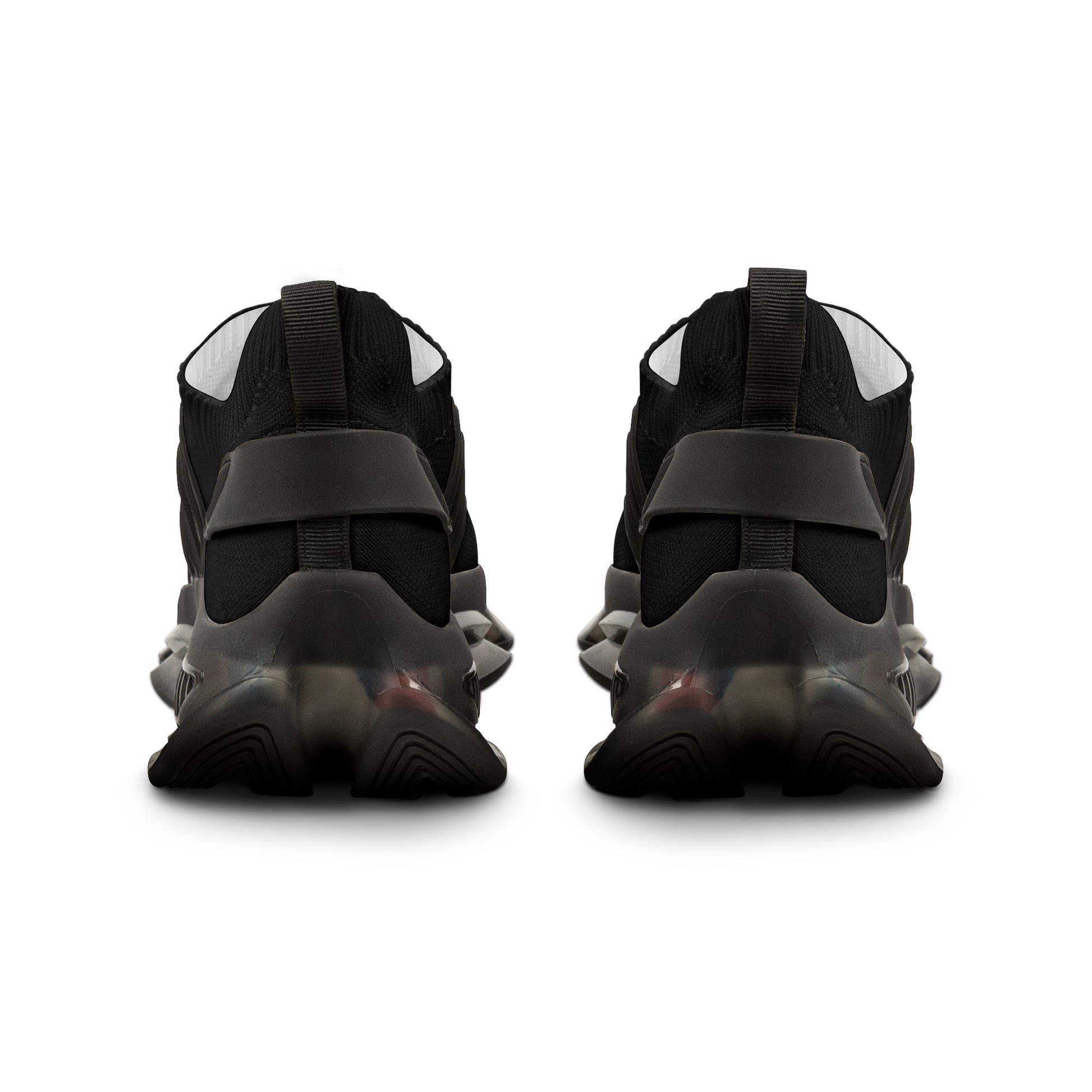 Black low-top 'EssenceInnoCreate' sneakers with a white sole on a white background