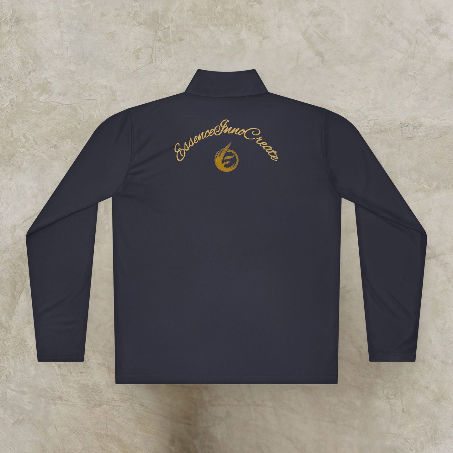 Black long-sleeve shirt with gold 'EssenceInnoCreate' logo on a textured beige background
