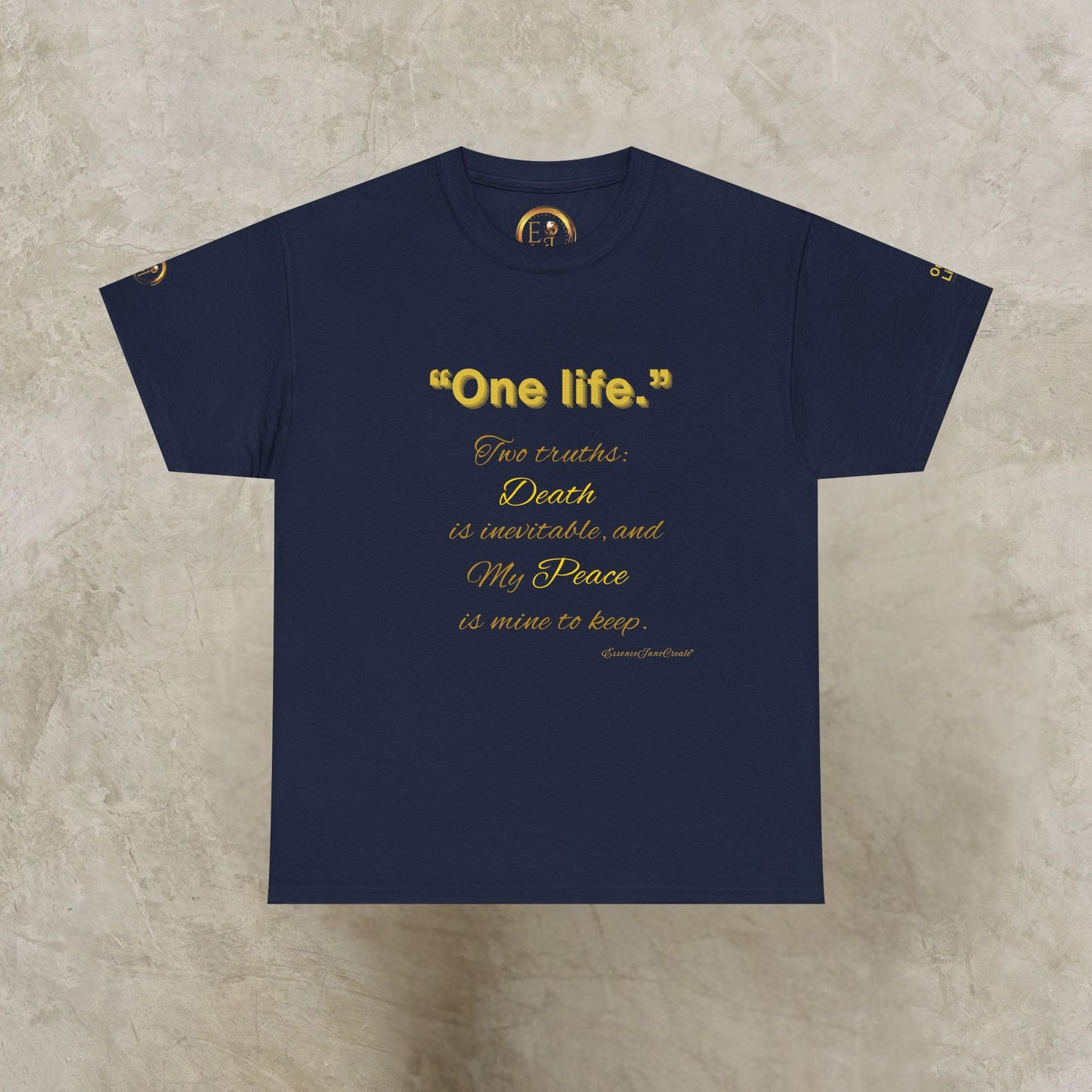 Navy blue t-shirt with gold One Life text on a textured beige background