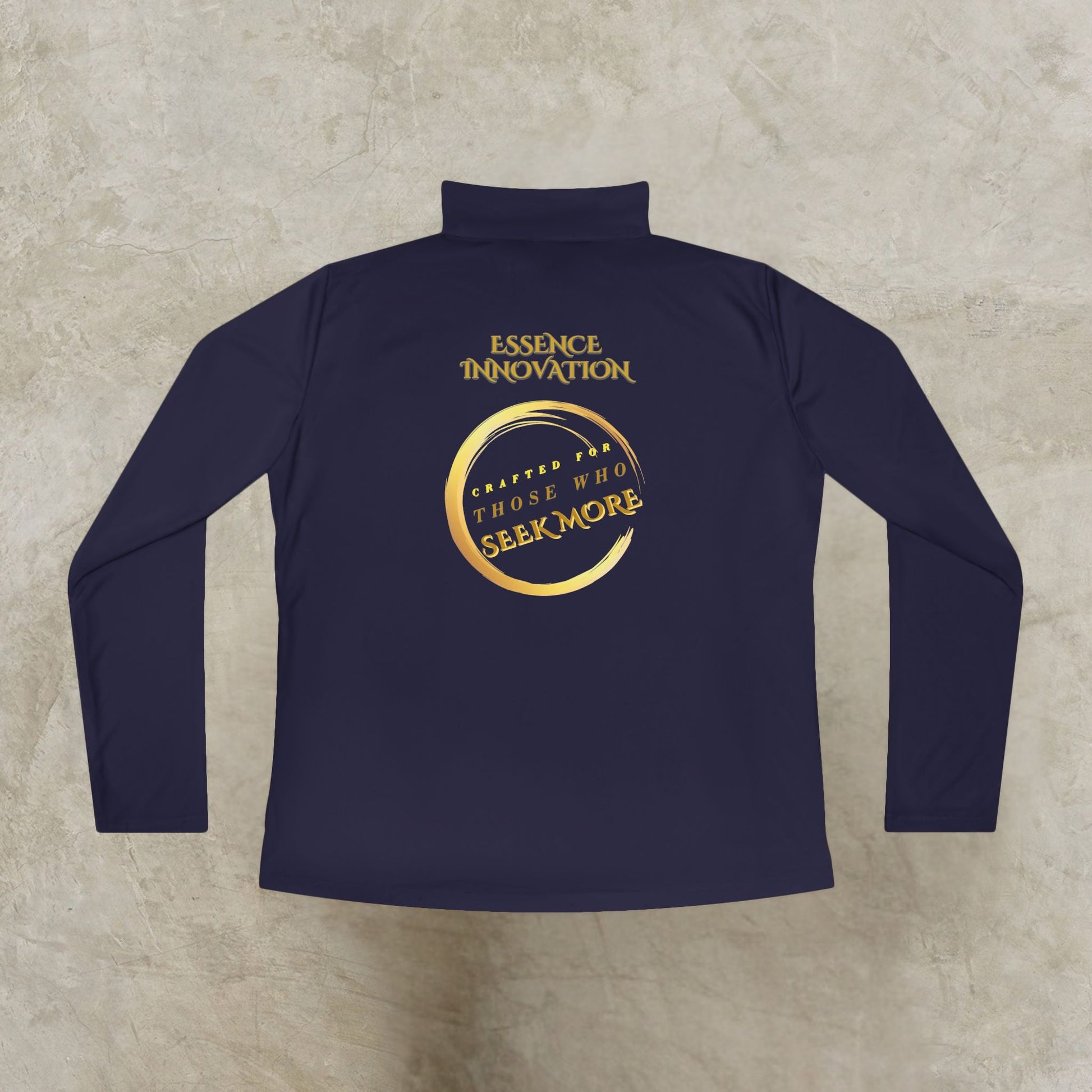 Navy long-sleeve Essence Innovation Seek More quarter-zip shirt with gold text on a beige background