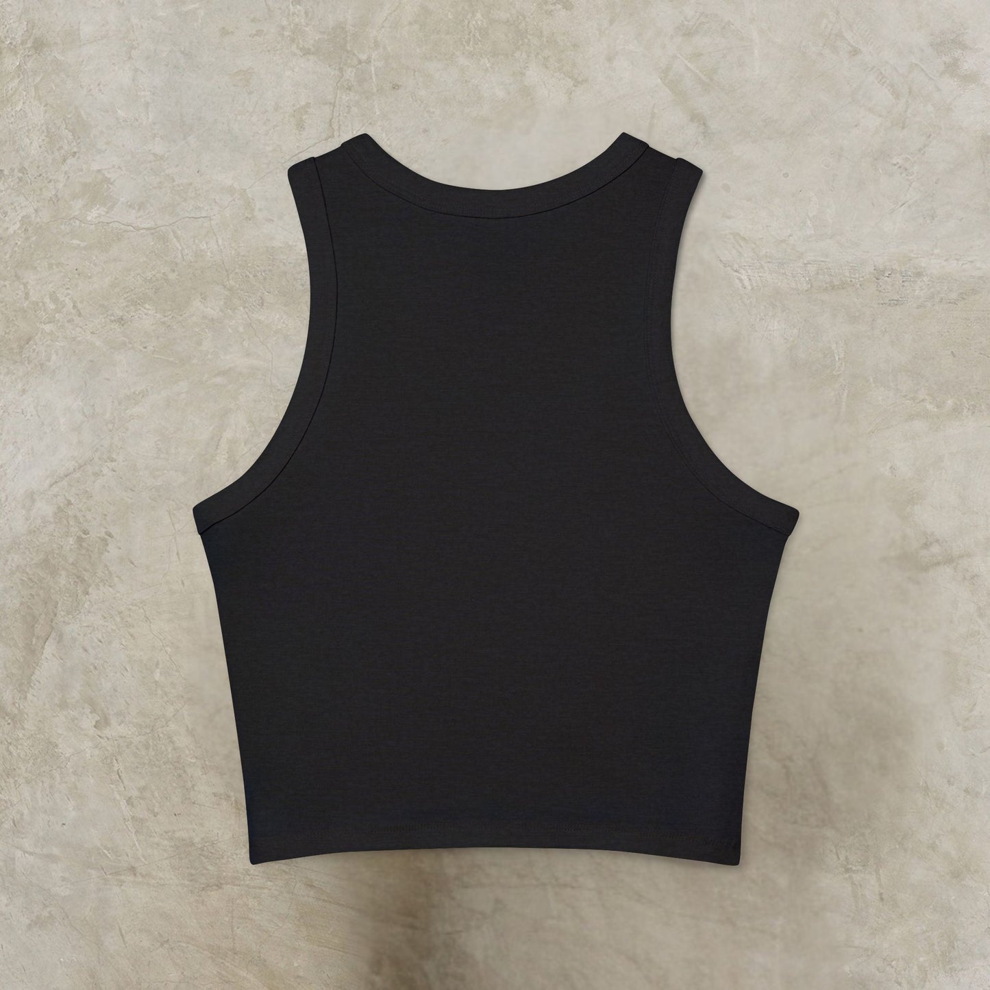 Black tank top on a beige textured background