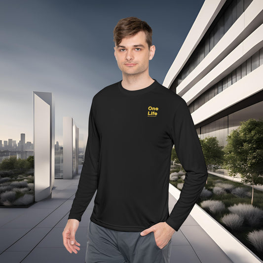 Man wearing a black long-sleeve shirt with 'One Life' text in a modern outdoor setting