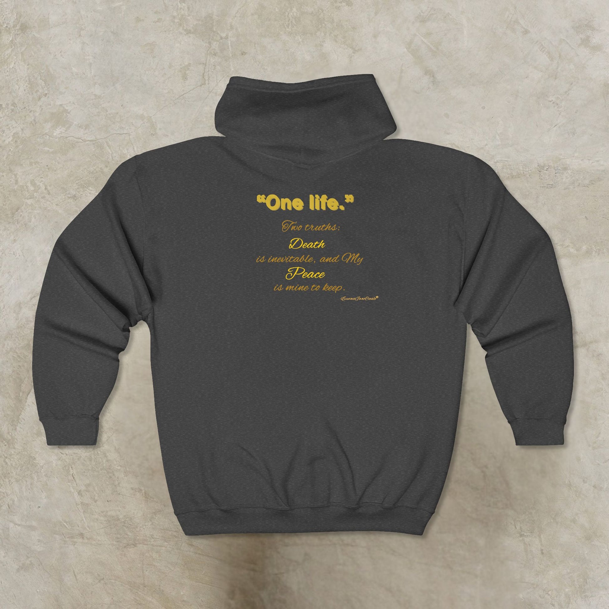 Black Essence Innovation 'One Life' hoodie with yellow text on a beige background