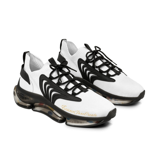 White and black 'EssenceInnoCreate' sneakers with unique sole design on a white background