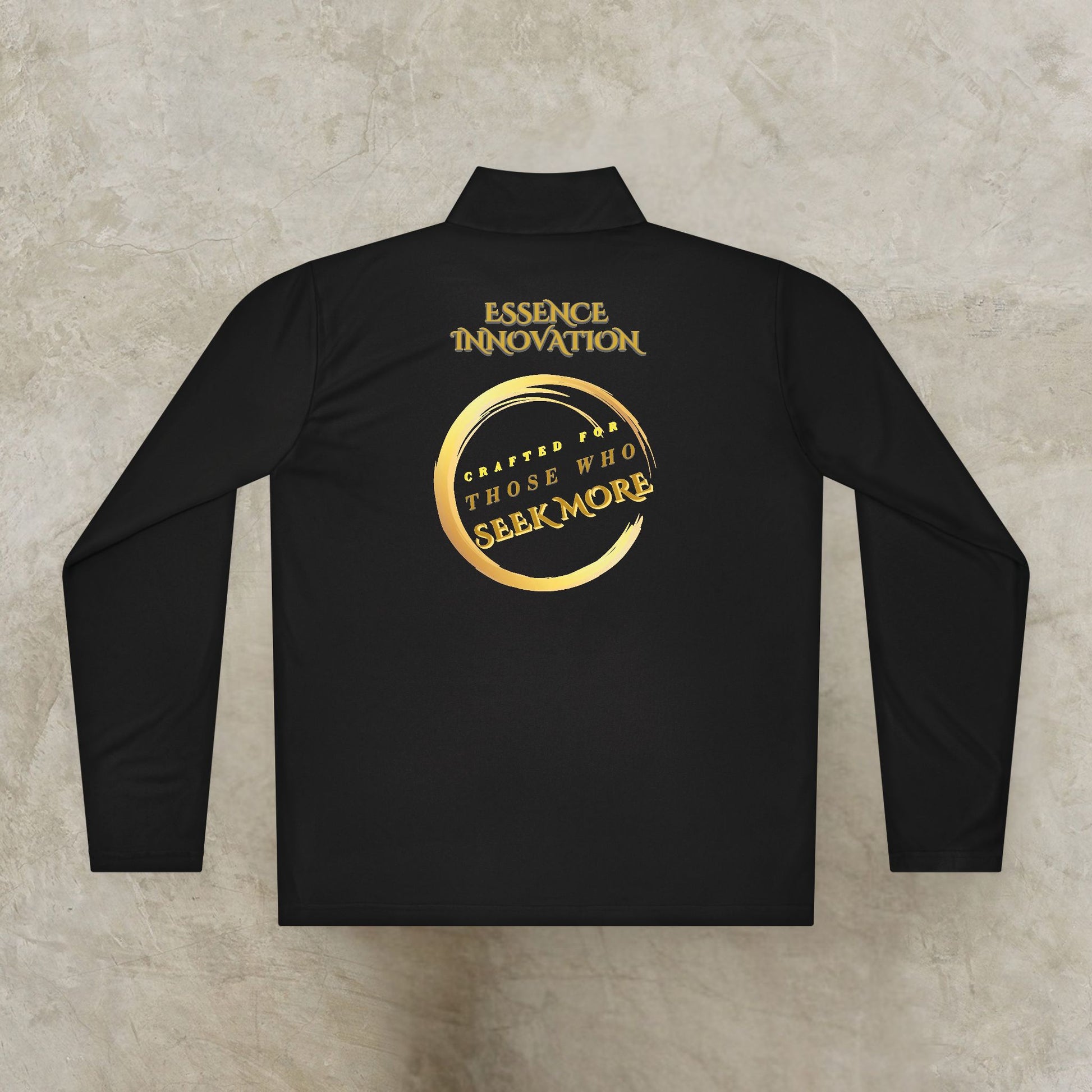 Black Essence Innovation Seek More long-sleeve shirt with gold text on a textured beige background