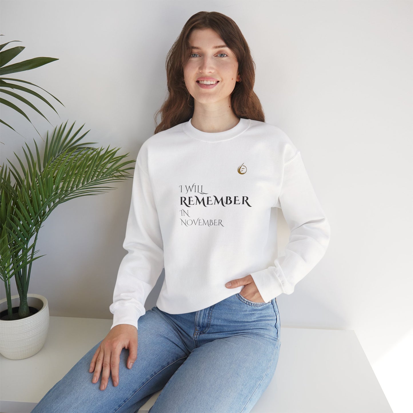 EssenceInnoCreate Quiet Resolve 'I WILL REMEMBER IN NOVEMBER' sweatshirt.
