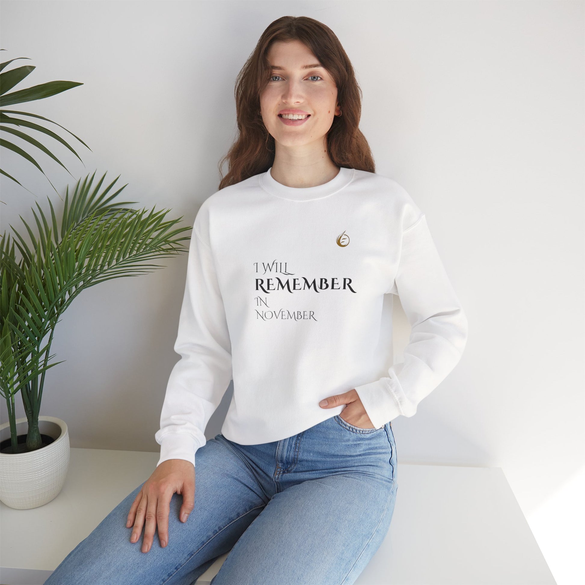 EssenceInnoCreate Quiet Resolve 'I WILL REMEMBER IN NOVEMBER' sweatshirt.