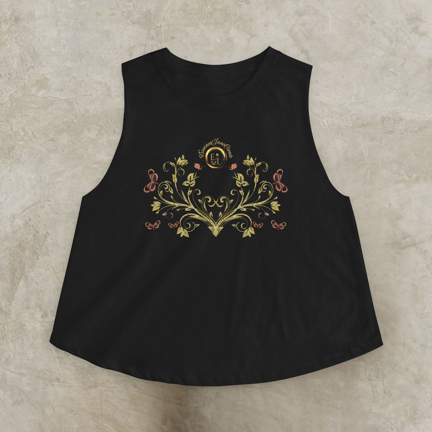Black sleeveless top with Essence Innovation Bohemian Butterfly floral embroidery on a beige background