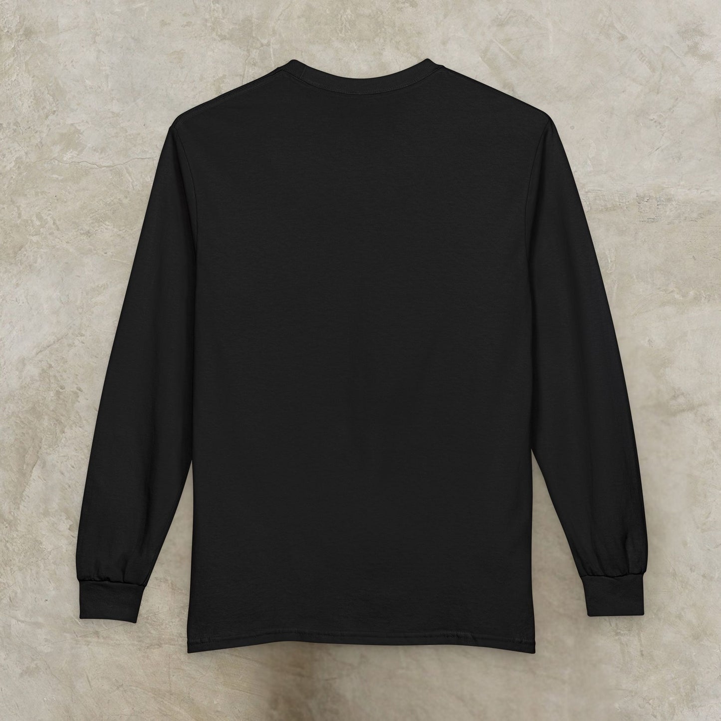 Essence Innovation 'Design Meets Soul' Black long-sleeve shirt on a beige textured background