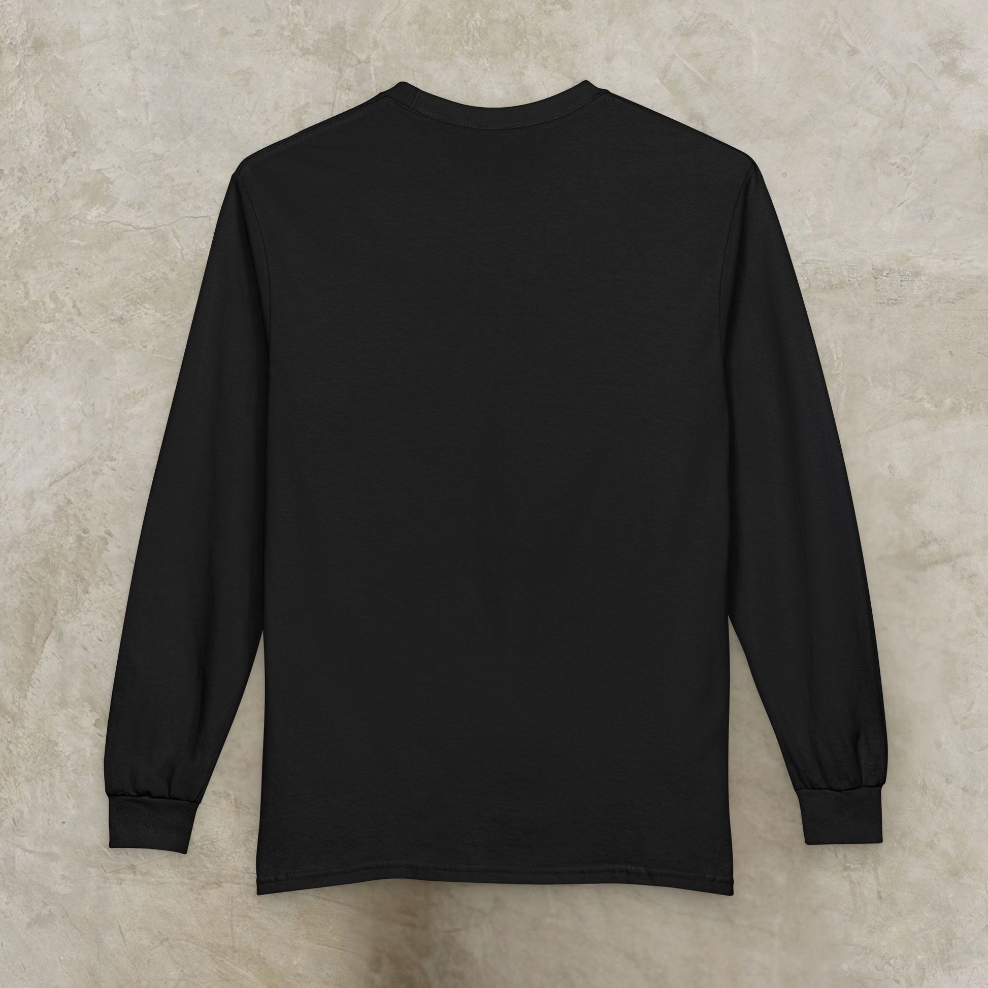 Essence Innovation 'Design Meets Soul' Black long-sleeve shirt on a beige textured background
