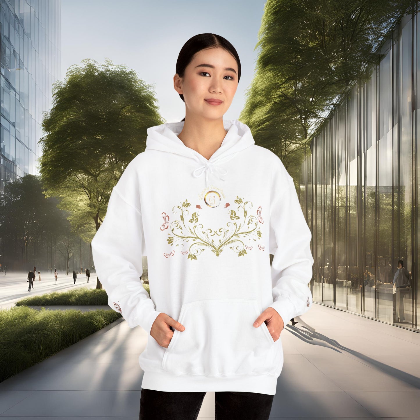 Person wearing a white hoodie with Essence Innovation Bohemian Butterfly Crest floral design in an urban setting