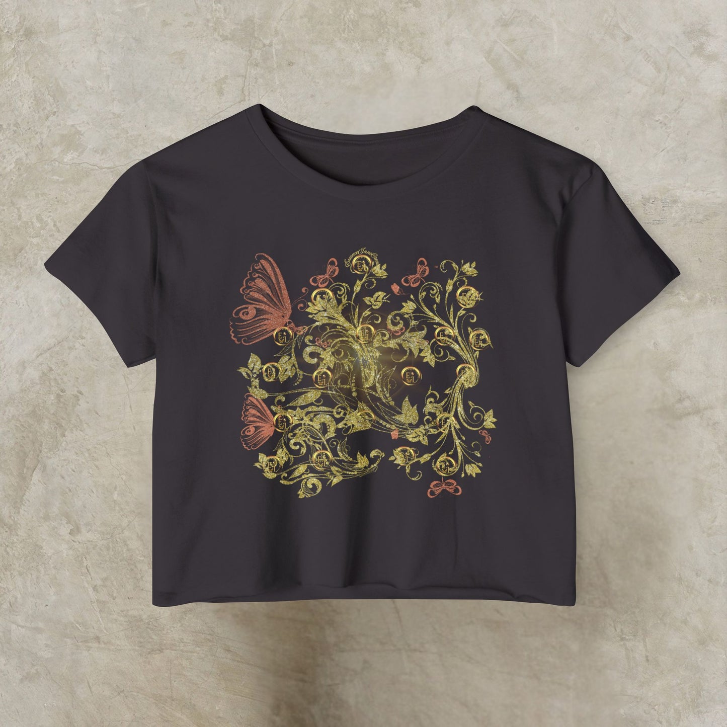 Dark gray t-shirt with Essence Innovation Bohemian Butterfly and floral design on a beige background