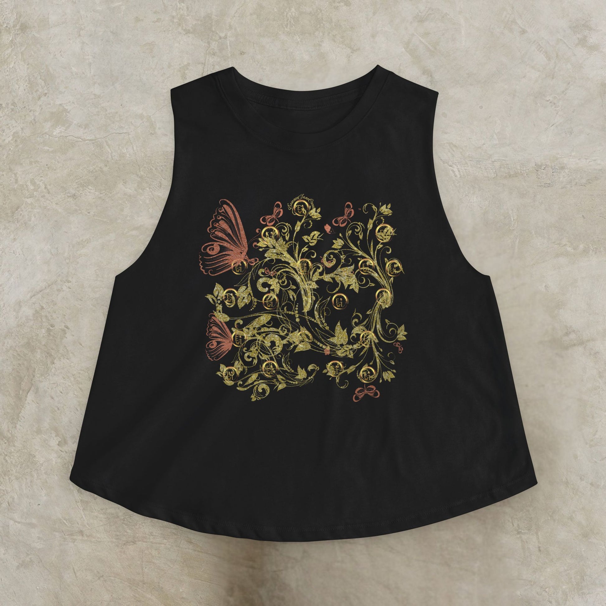 Black sleeveless top with Essence Innovation Bohemian Butterfly design on a beige background