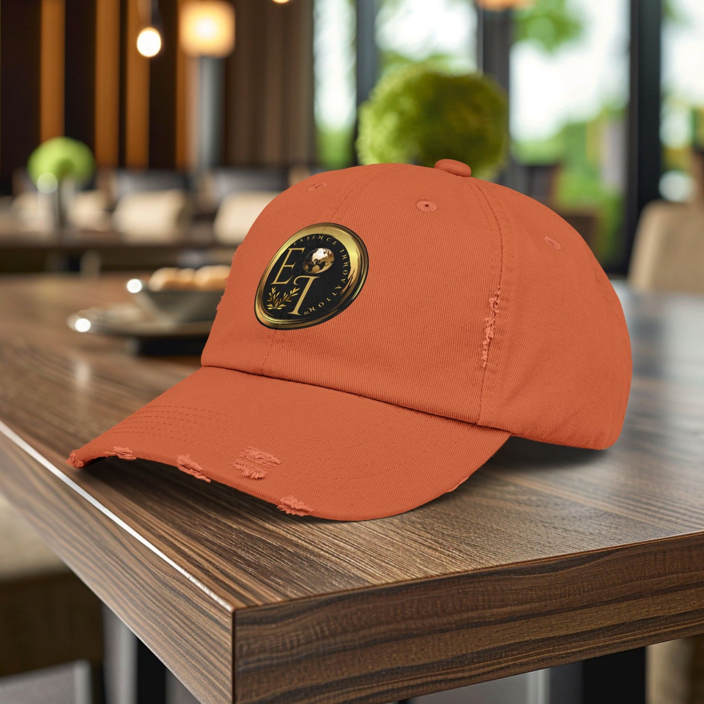 Orange Essence Innovation cap with a logo on a wooden table