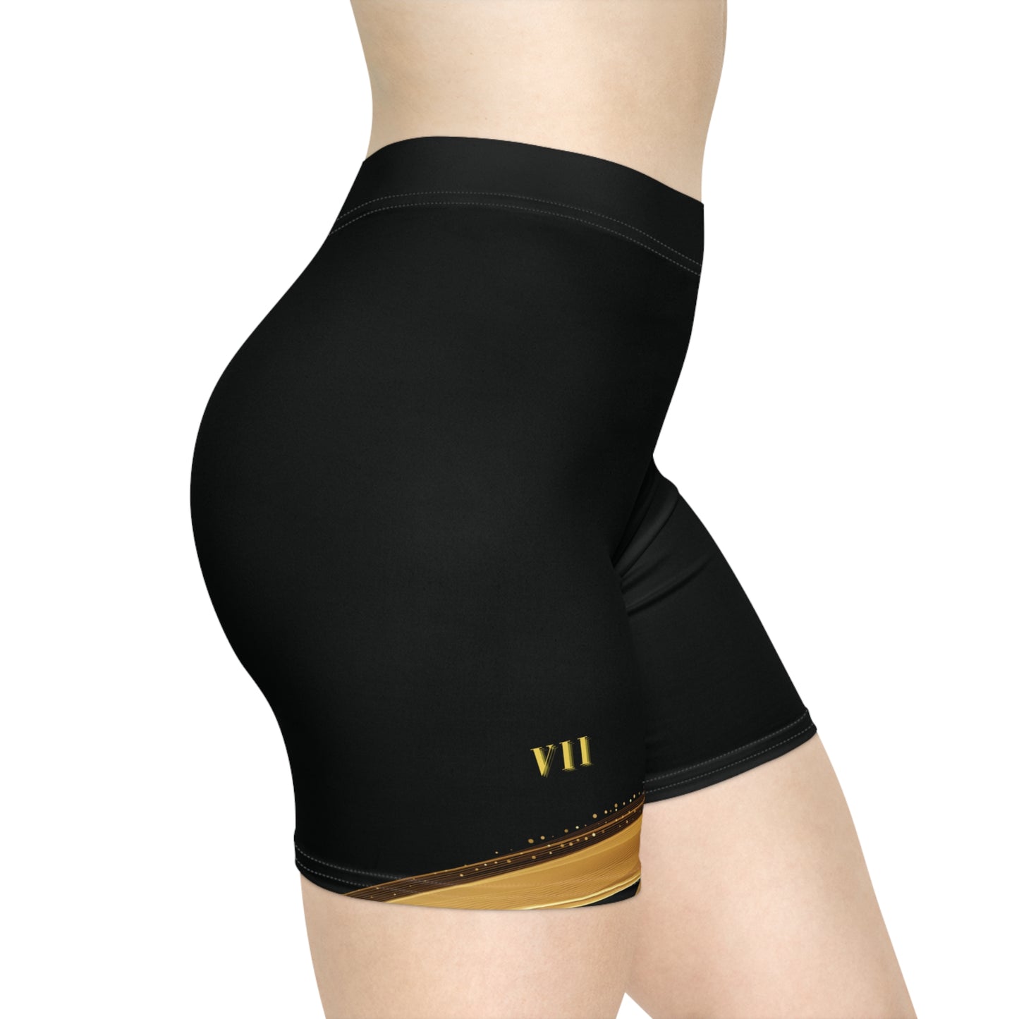 Black athletic shorts with gold waistband and logo on a white background