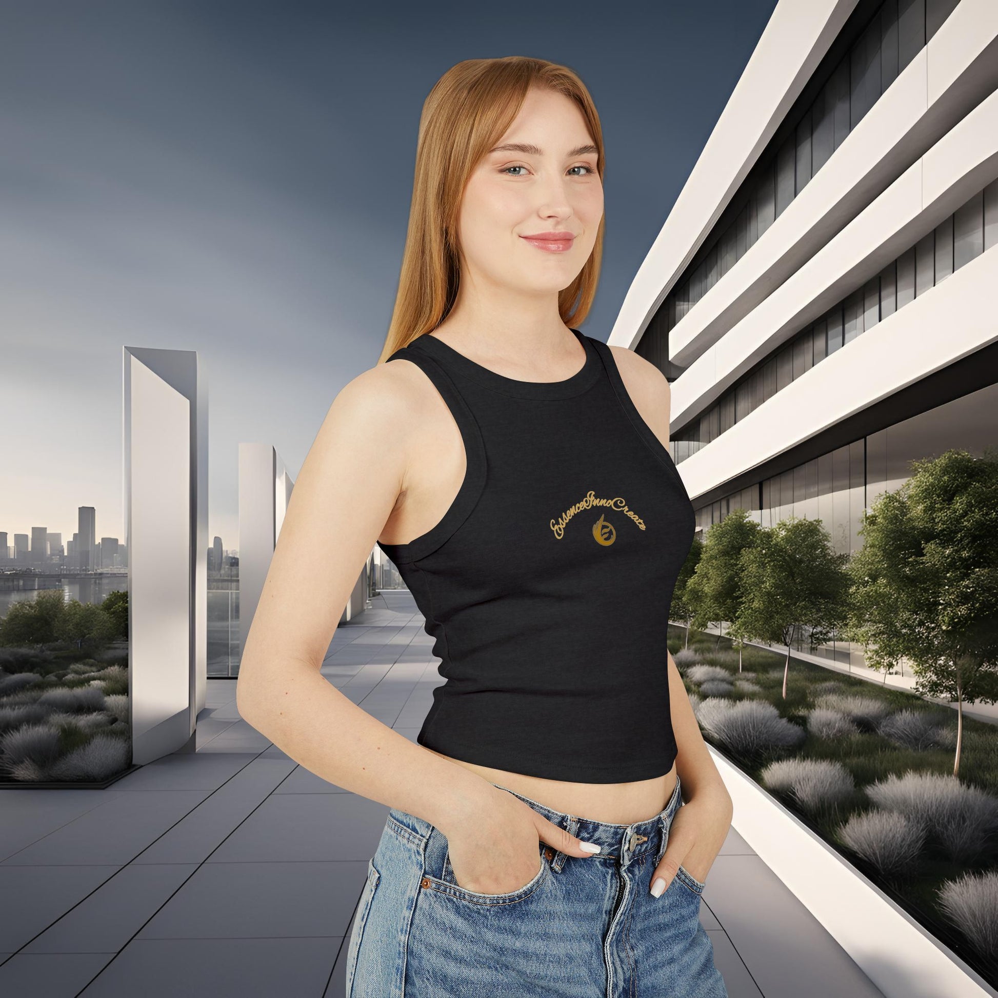 Woman wearing a black tank top with an EssenceInnoCreate logo in an urban setting