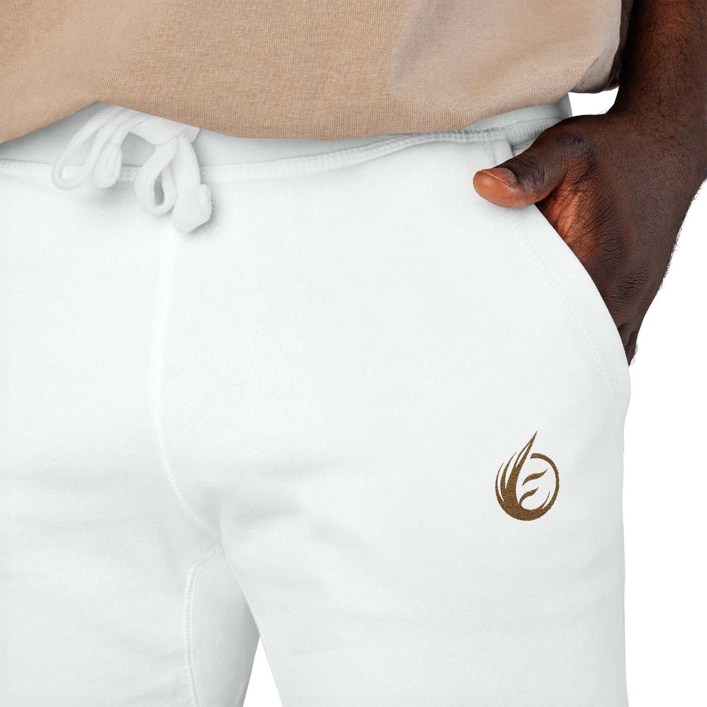 White sweatpants 'EssenceInnoCreate' Quiet Resolve Logo, worn by a person.