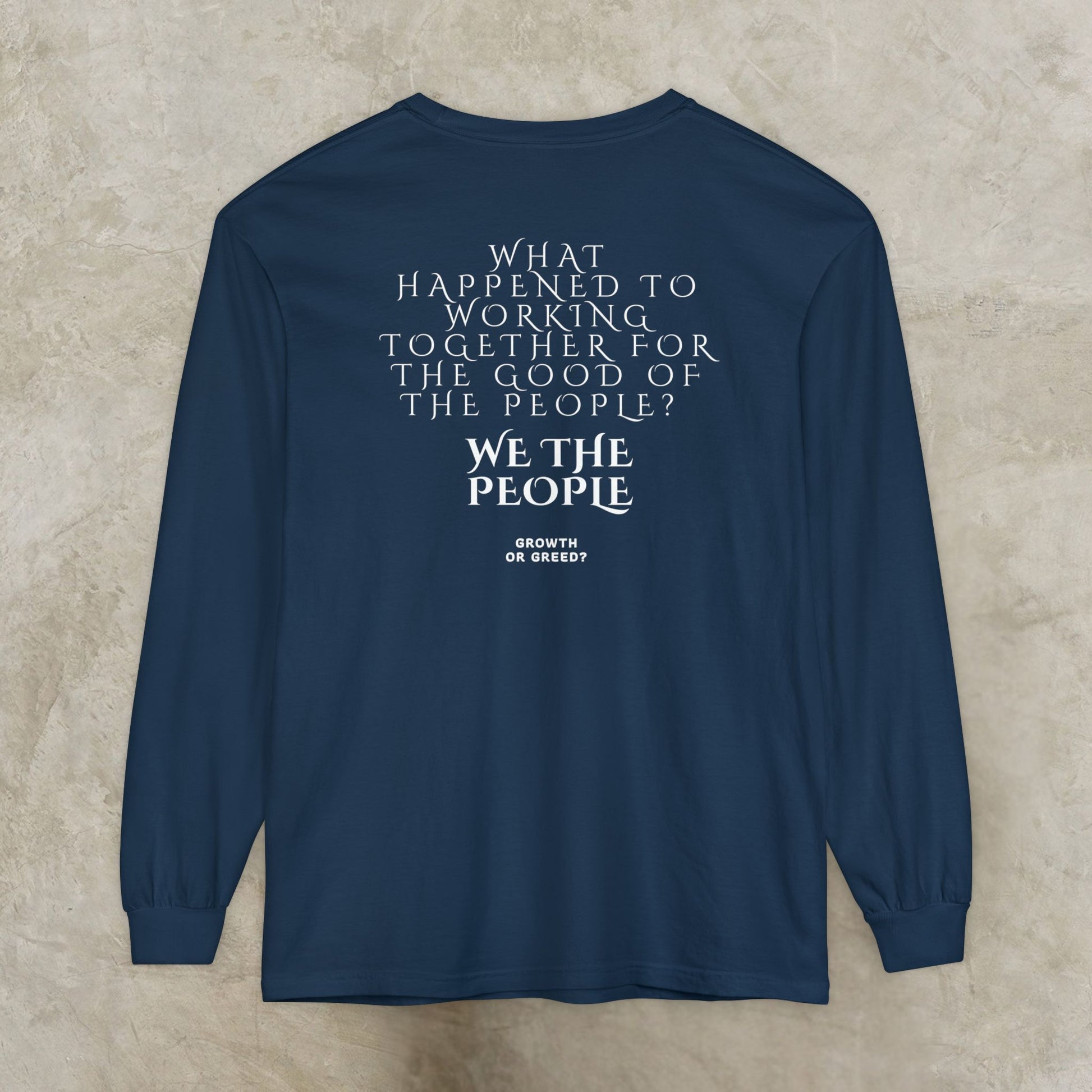 Navy blue long-sleeve EssenceInnoCreate Quiet Resolve shirt with white text on a beige background