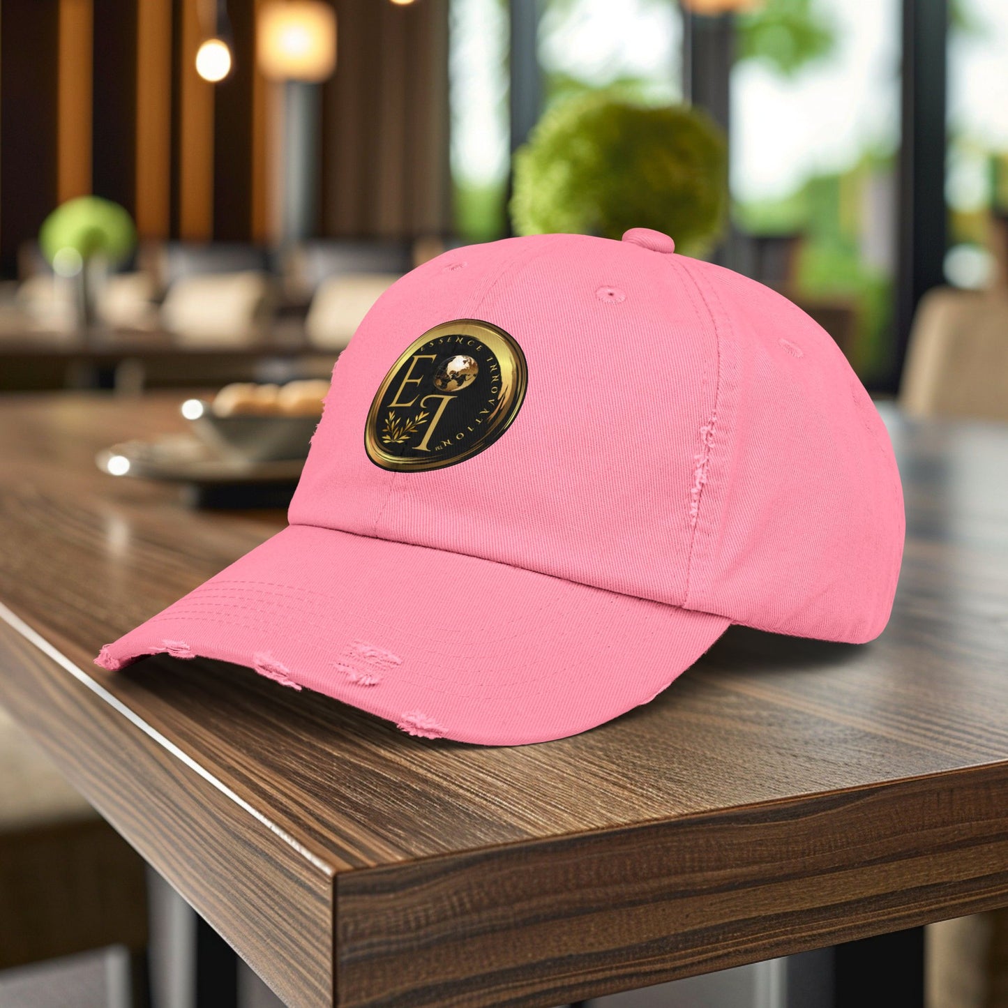 Pink Essence Innovation cap with a logo on a wooden table in an indoor setting