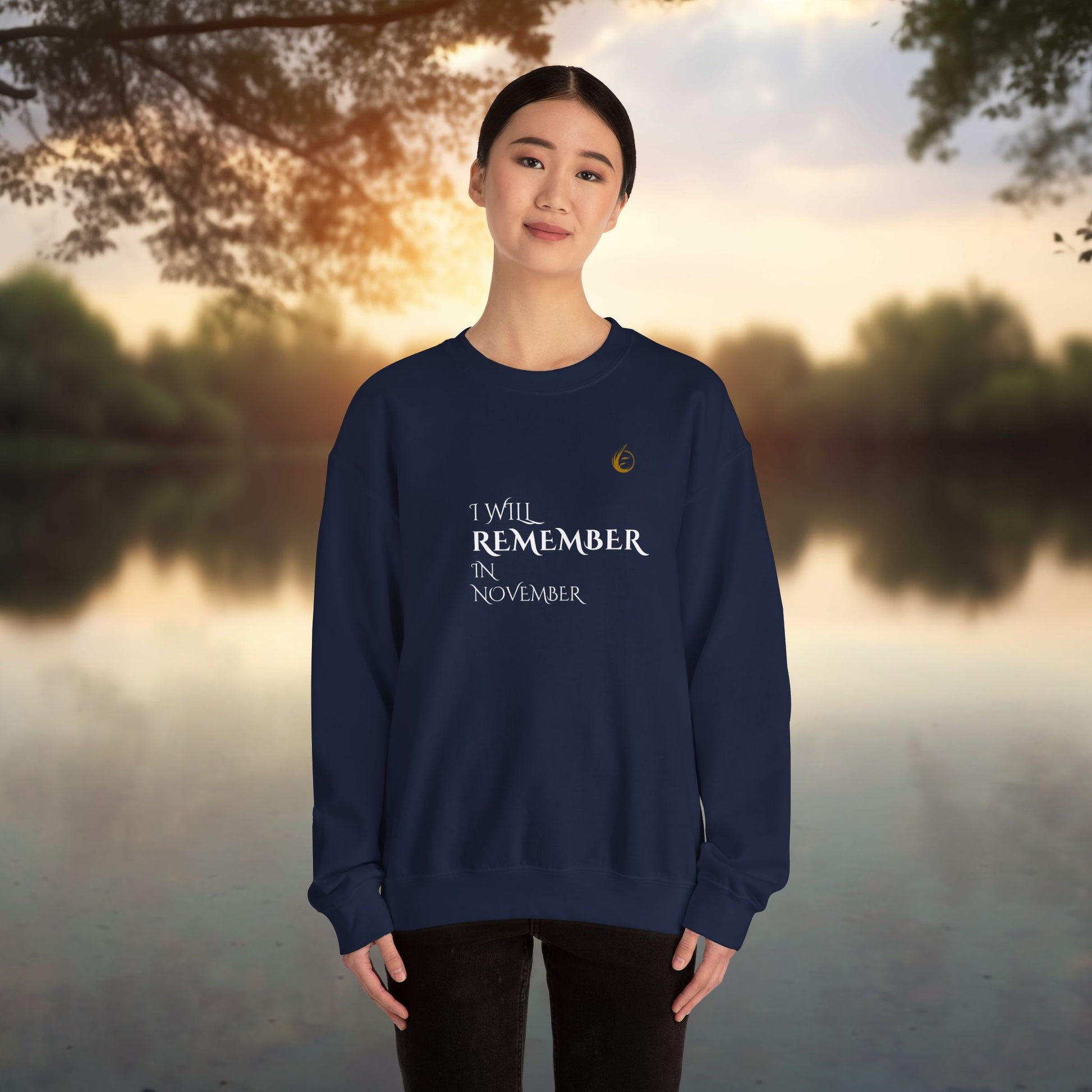EssenceInnoCreate Quiet Resolve sweatshirt with text 'I WILL REMEMBER IN NOVEMBER'.