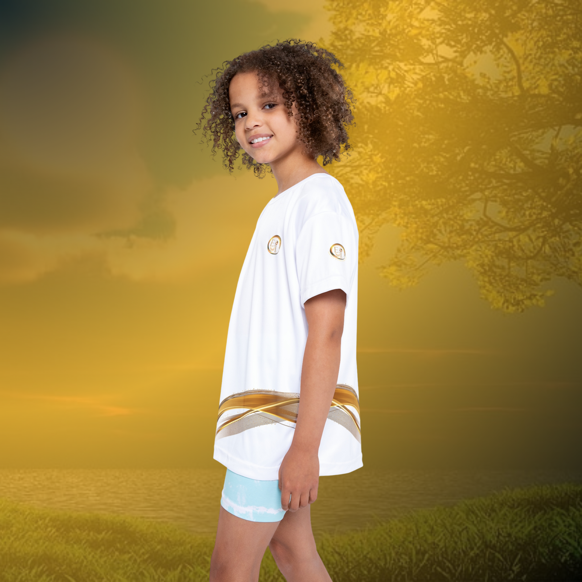 Child wearing a white t-shirt with a gold stripe and essence innovation logo on a white background