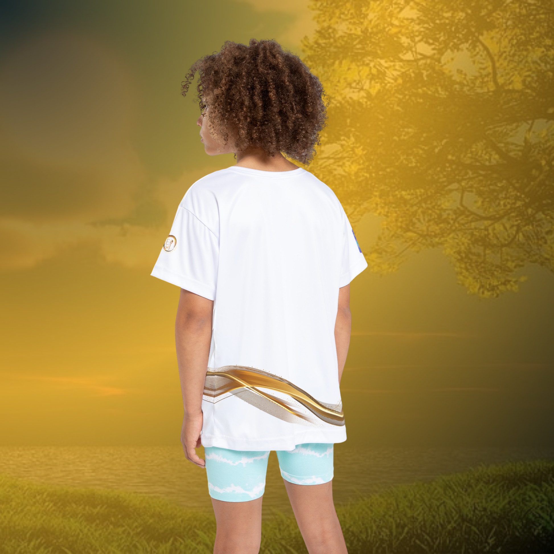 Child wearing a white t-shirt with a gold stripe and essence innovation logo on a white background