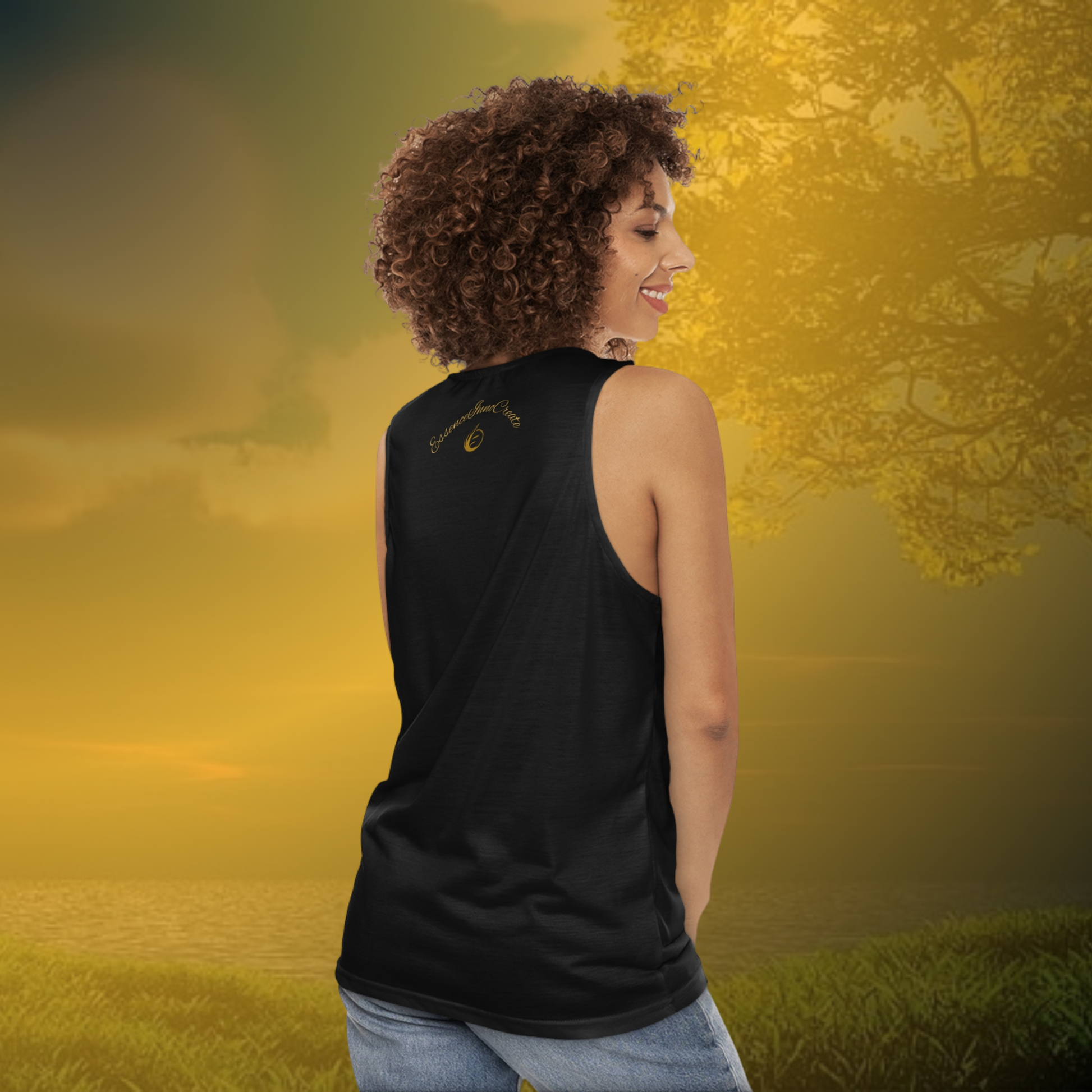Woman wearing a black EssenceInnoCreate tank top with gold text design on a white background