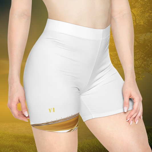 White Essence Innovation athletic shorts with a brand logo on a yellow background